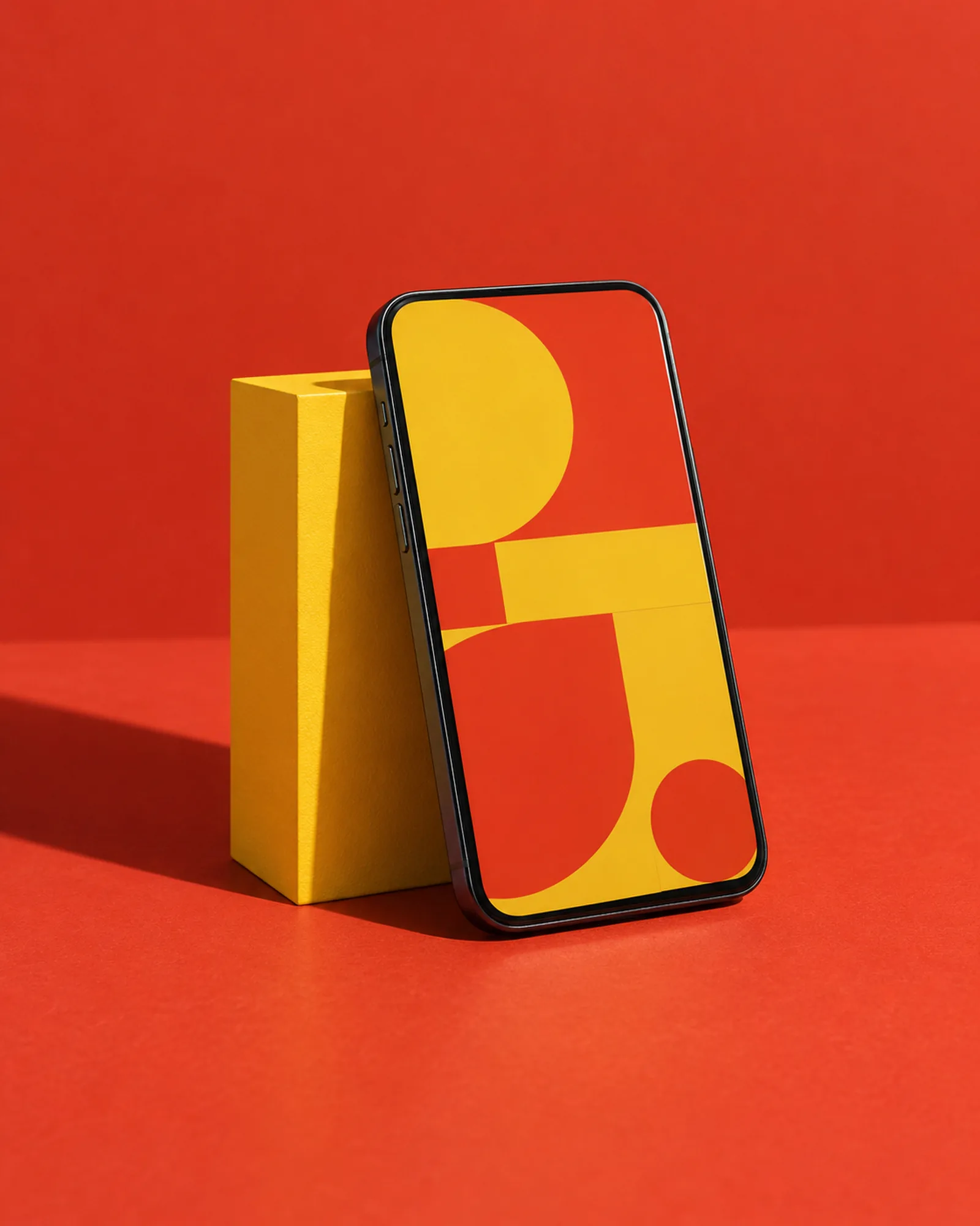 A phone showing a colour-block layout on a yellow block