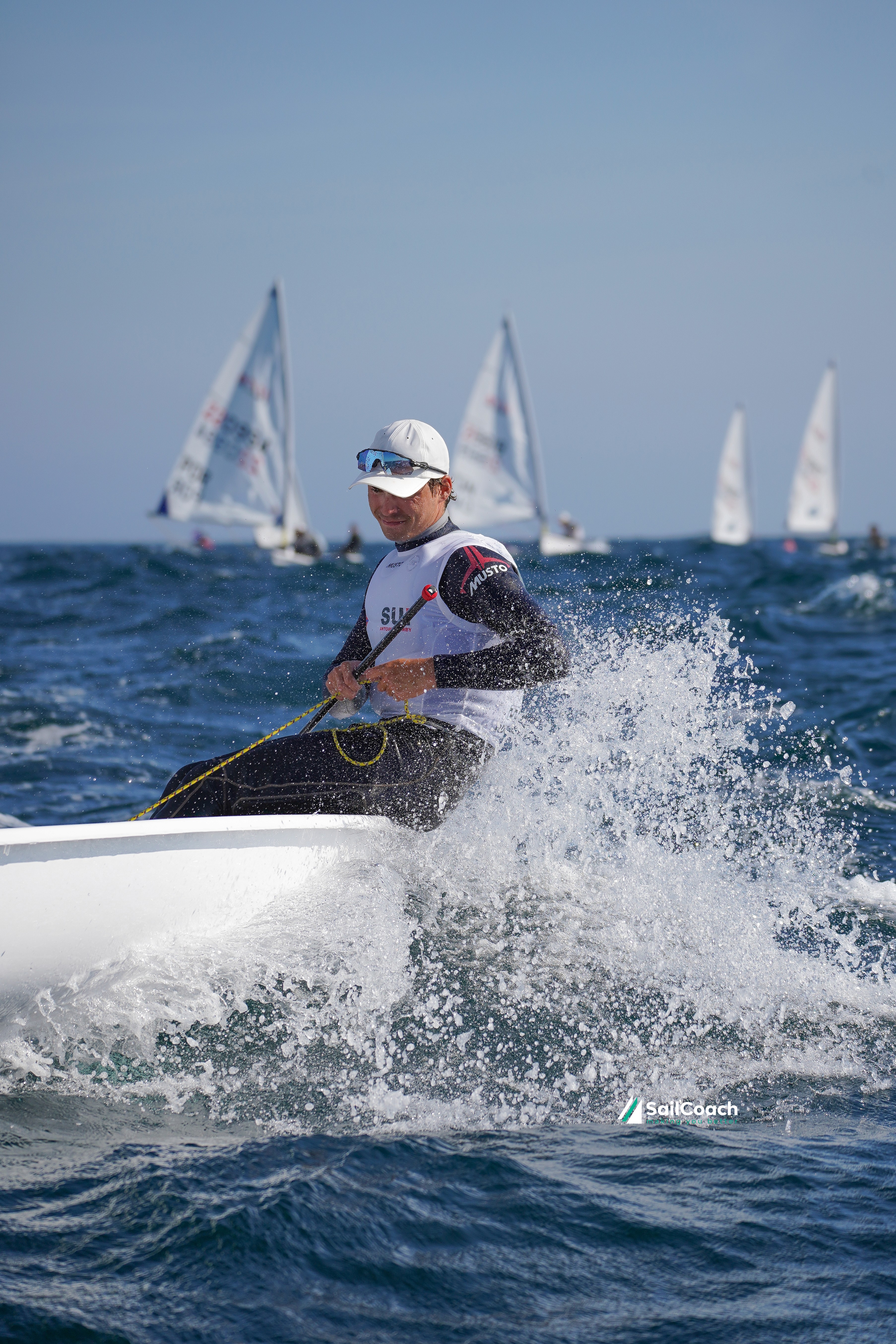 Group of men standing with Sufboard