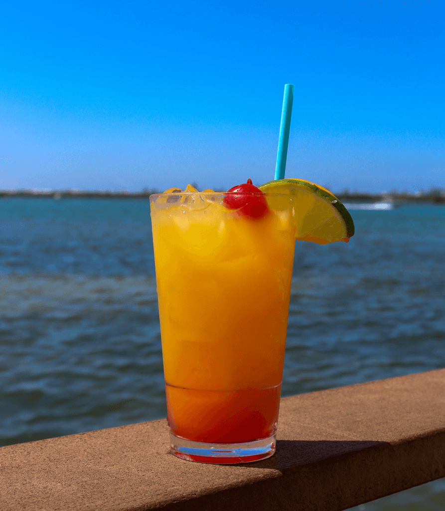 cocktail with water in background
