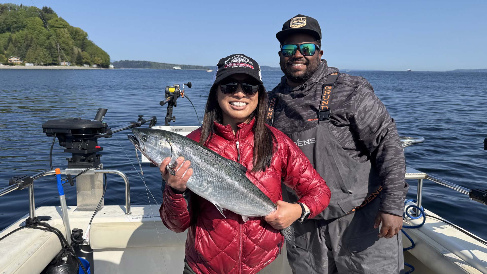 Charter boat captains holding their caught fish