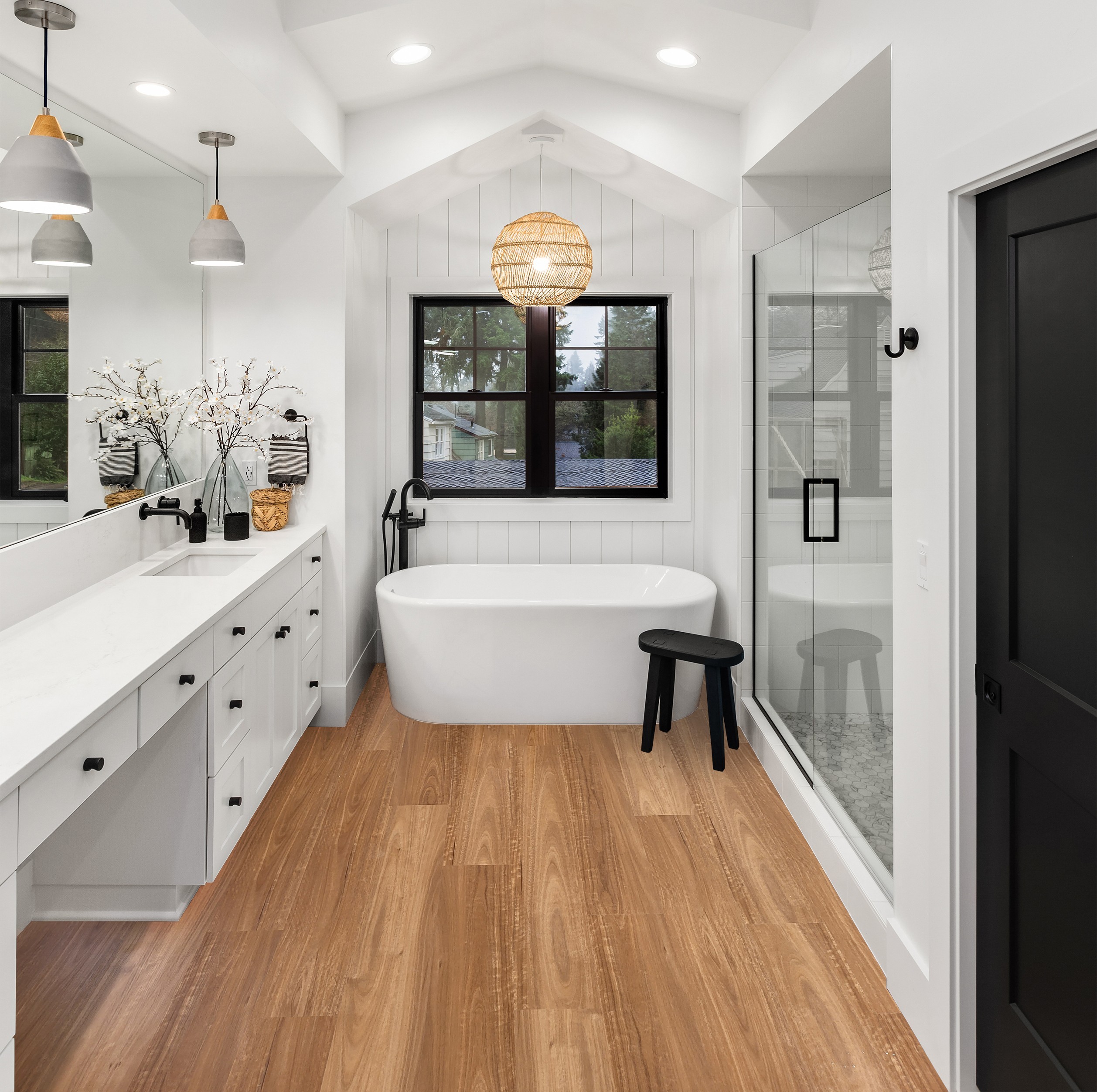 Finished bathroom with level timber-look hybrid flooring, delivering a seamless, water-resistant finish that lasts.