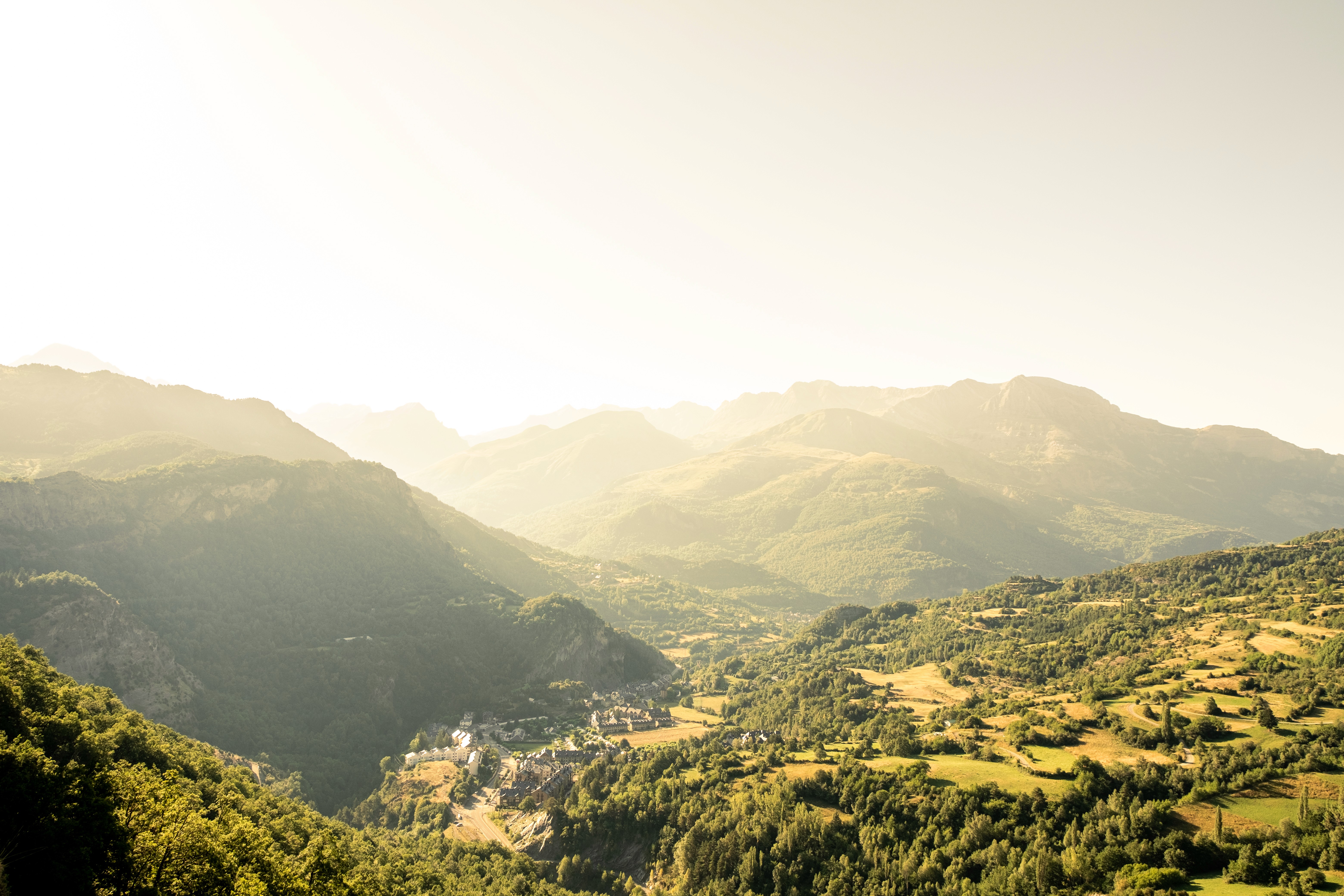 Modern curved staircase with warm ambient lighting
