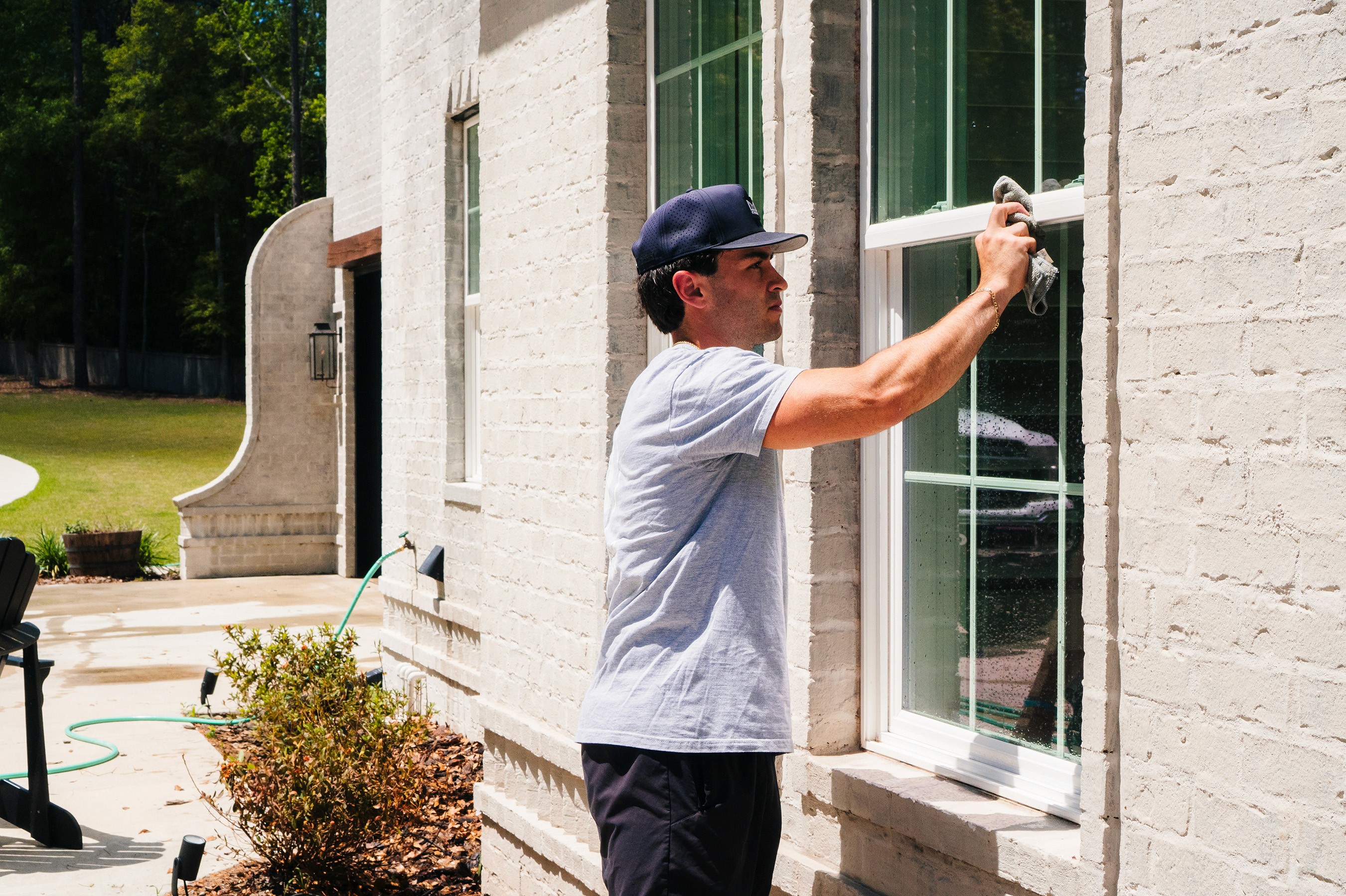Worker washing window