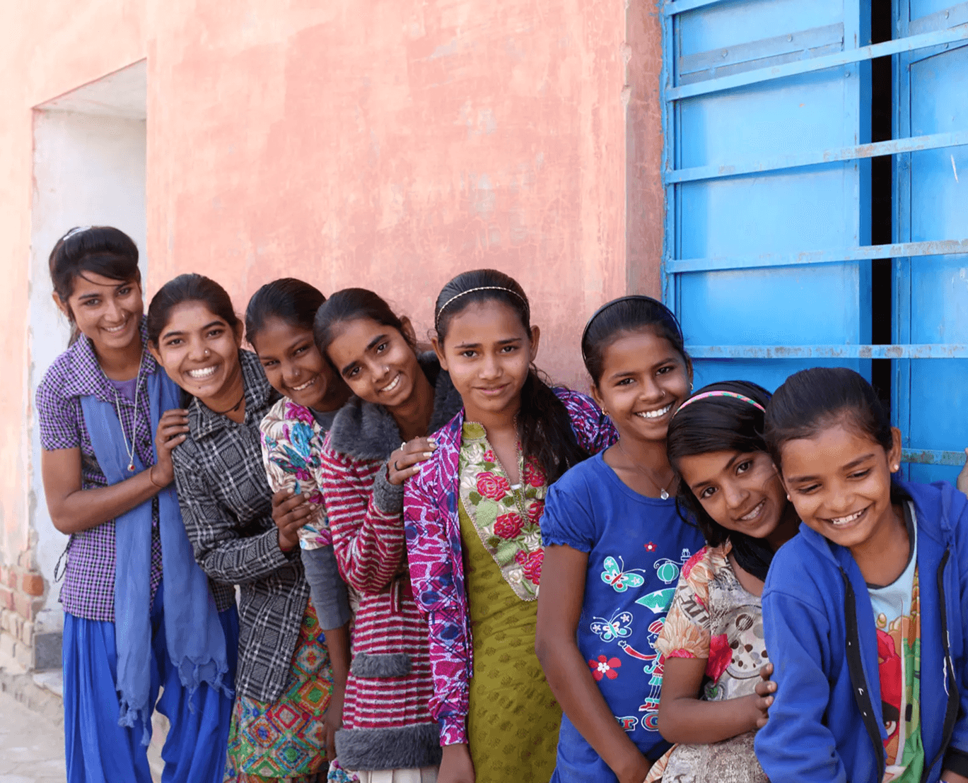 Group of men standing with Sufboard