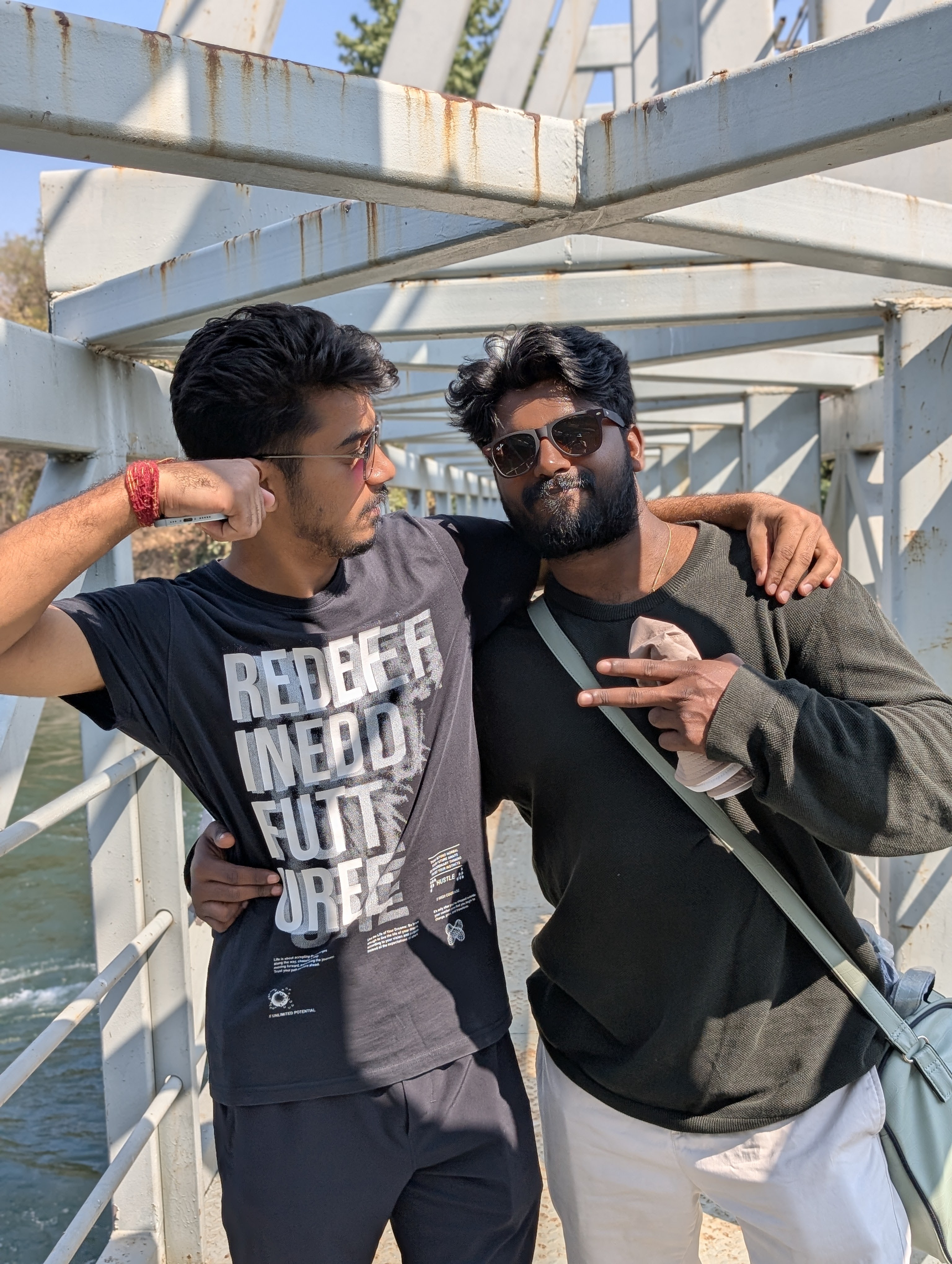 a group of people standing on top of a sandy beach