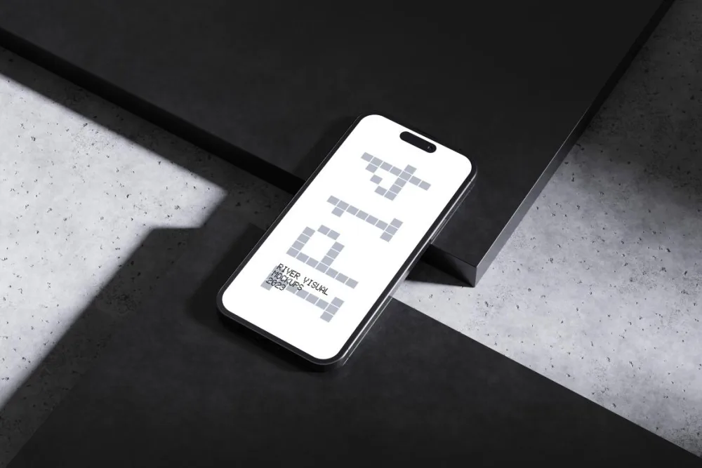 A modern smartphone mockup placed diagonally on a sleek black and textured blue surface. The display is well-lit, contrasting with shadowed geometric panels for a contemporary design aesthetic.