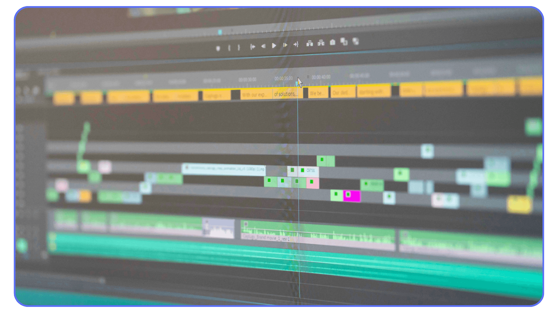 Video editing timeline on software interface – close-up view of a non-linear video editor showing multiple layered clips and audio tracks on a timeline.