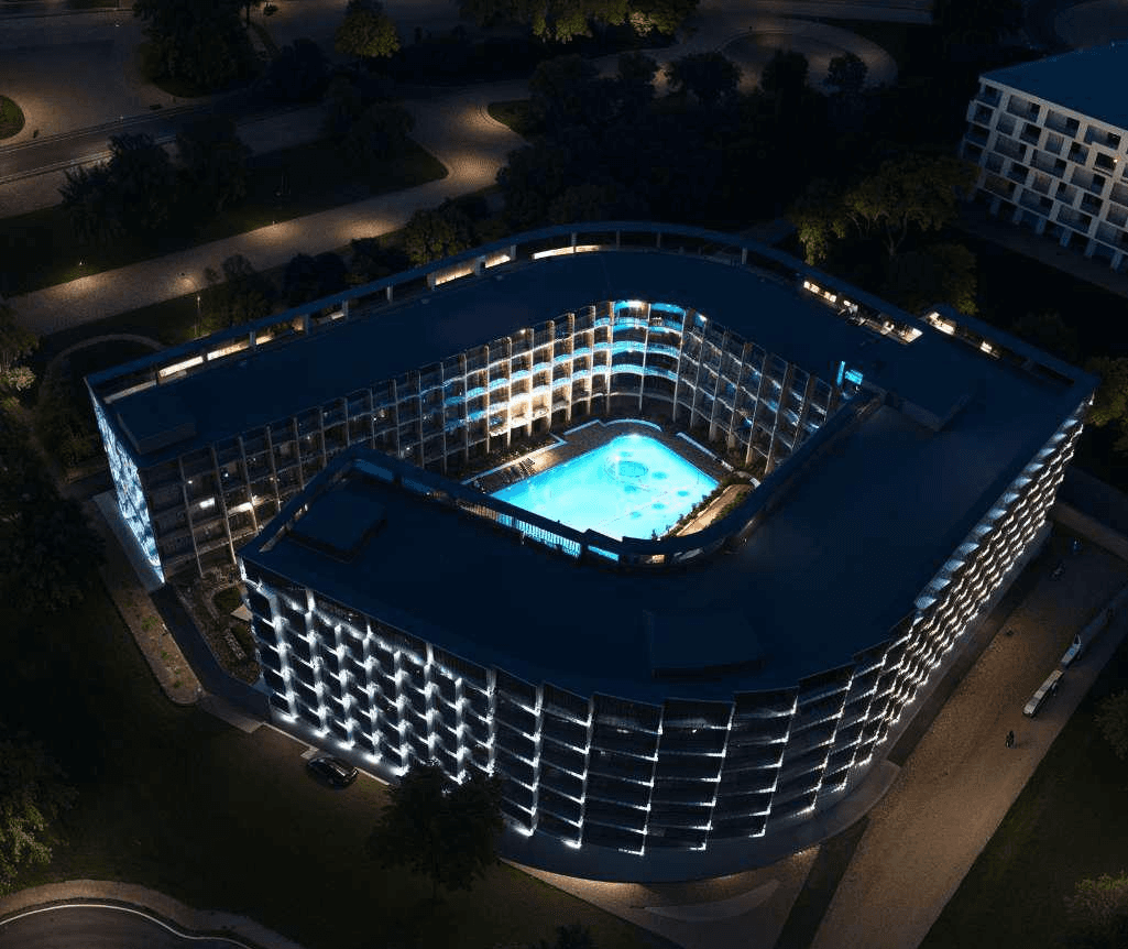 High-angle night view of the Binghatti Hillcrest courtyard. Top-tier real estate agent services in Dubai.