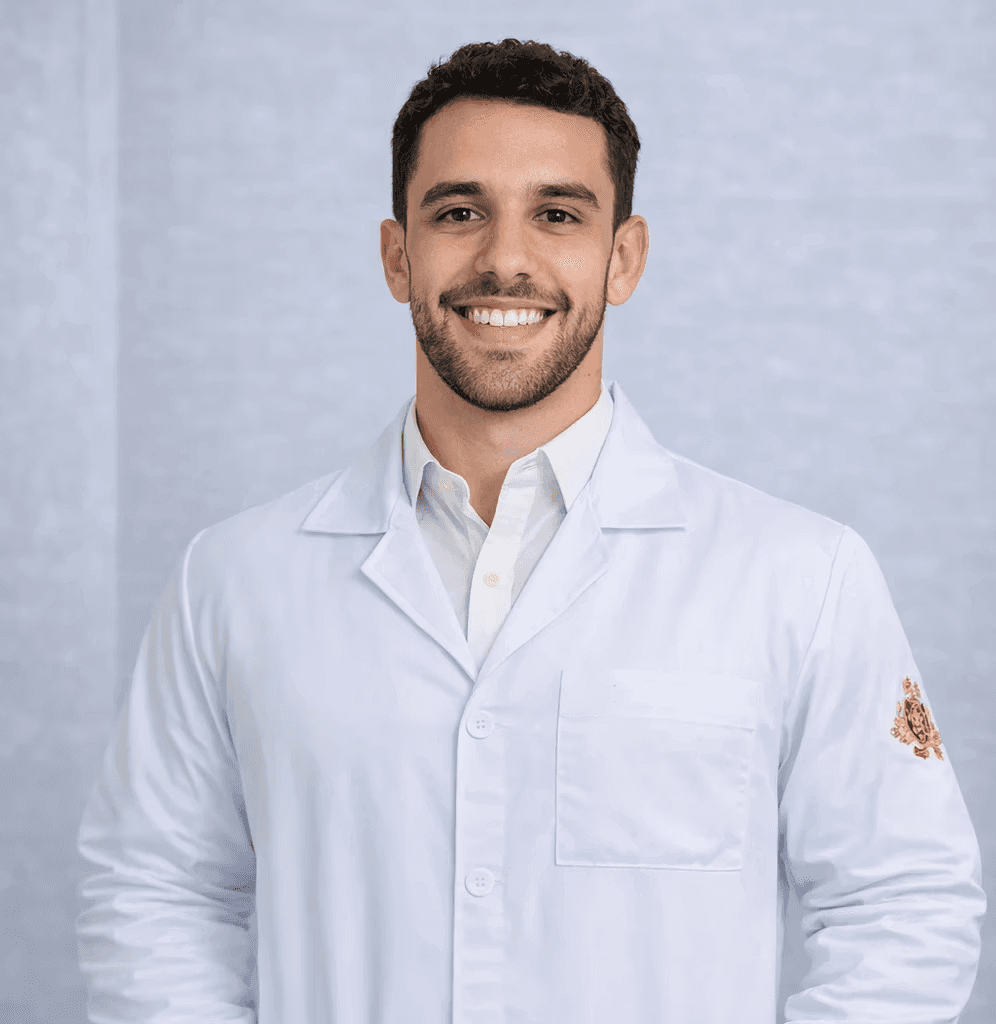 man in white dress shirt wearing black framed eyeglasses