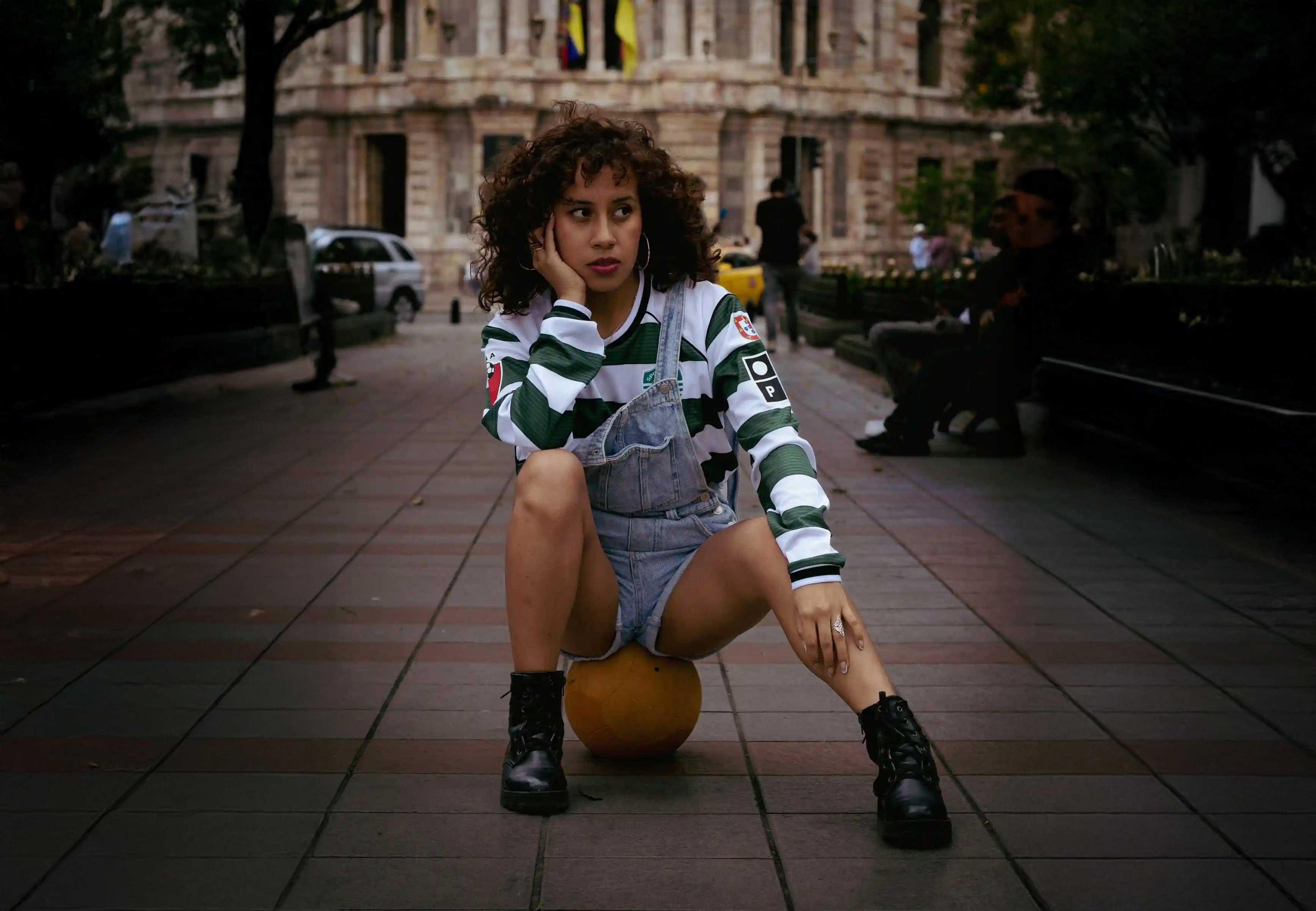 Image of a model wearing a  retro jersey