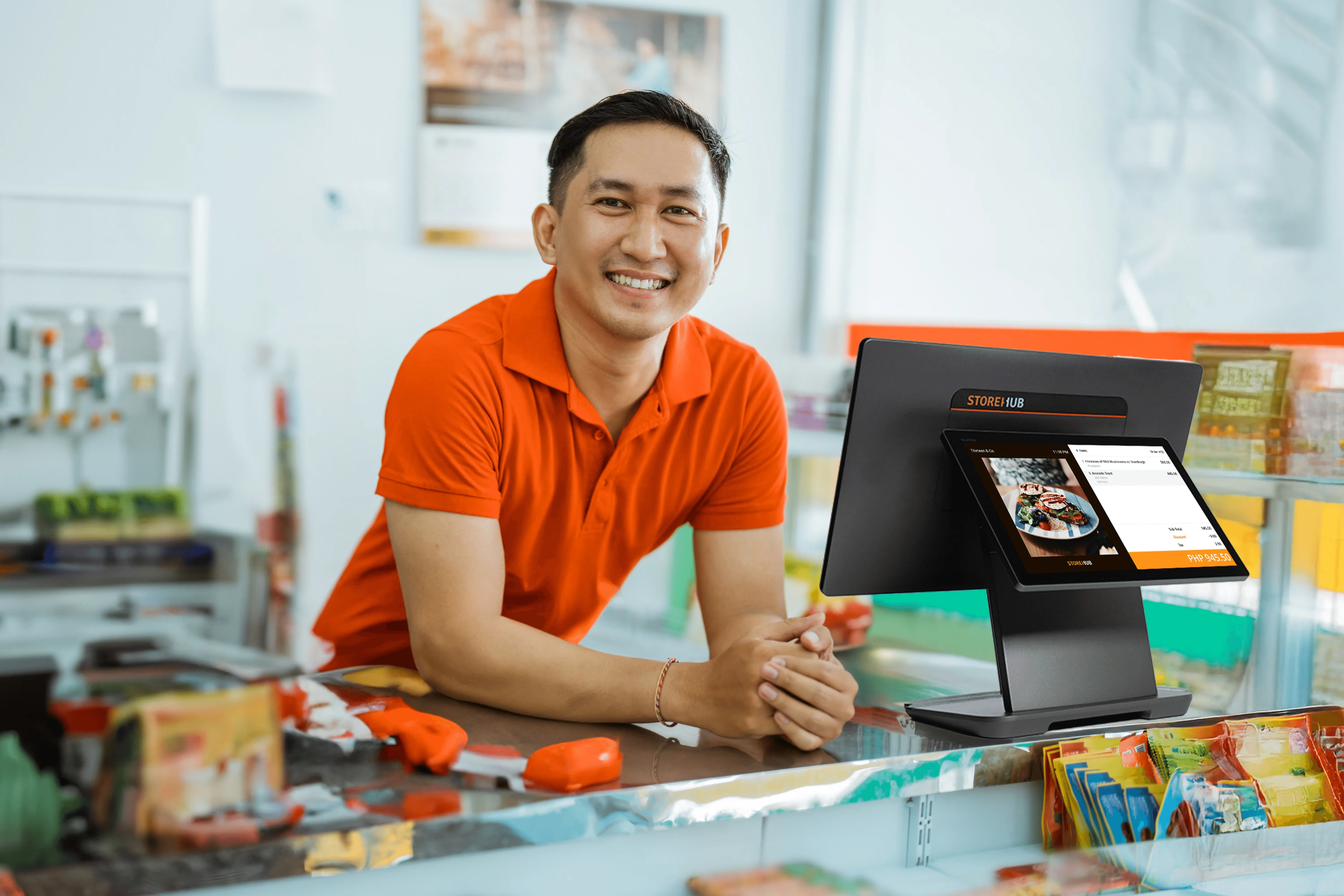 Philippines convenience store owner using the StoreHub retail POS system for inventory management and checkout transactions.