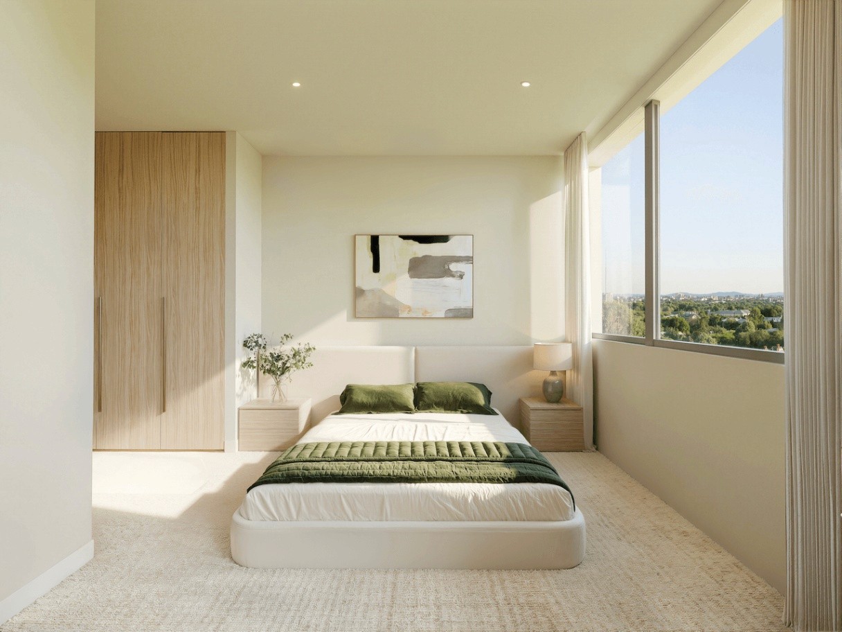 Modern bedroom interior at COMO Varsity Lakes with natural light, soft finishes and built-in wardrobe