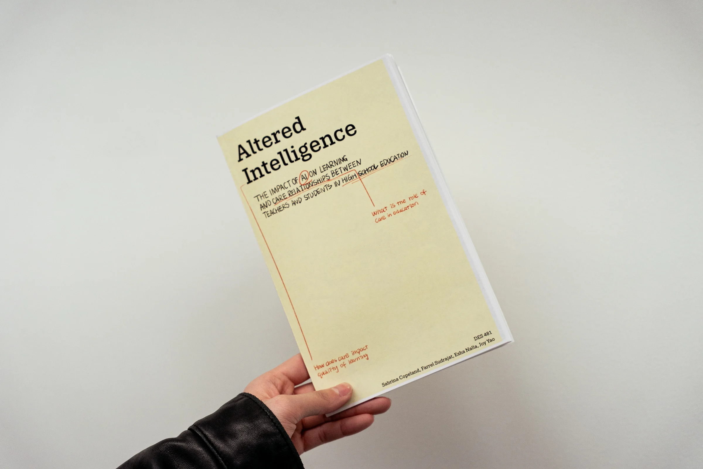 The Altered Intelligence workbook, held open