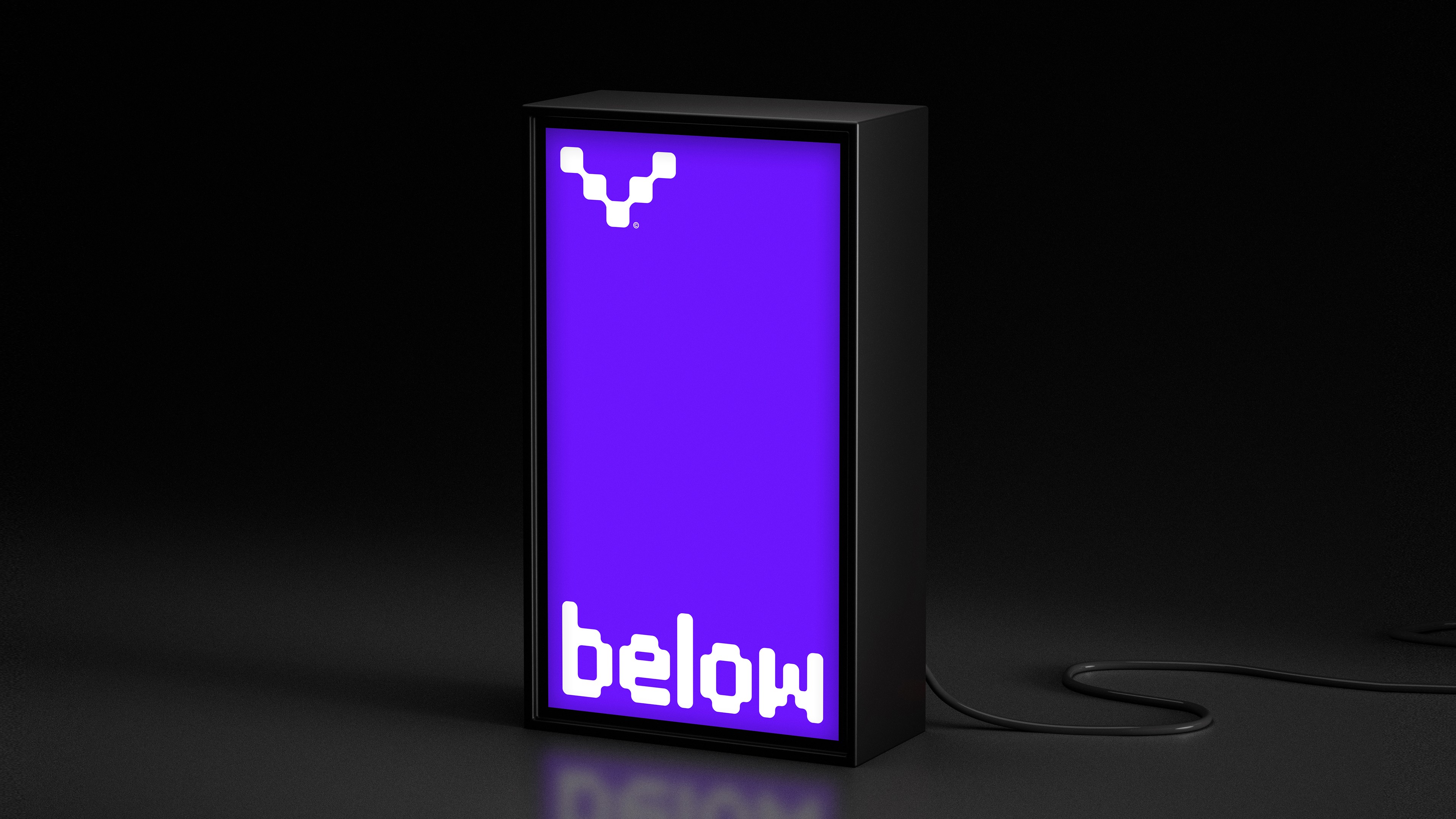 Modern home office setup with a monitor, ergonomic chair, keyboard, and indoor plants near a window with blinds.