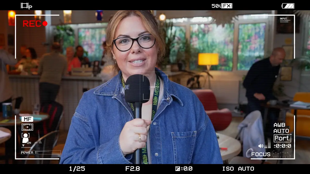 Testimonial interview recorded at a YAB business meeting in Manchester during corporate event filming.