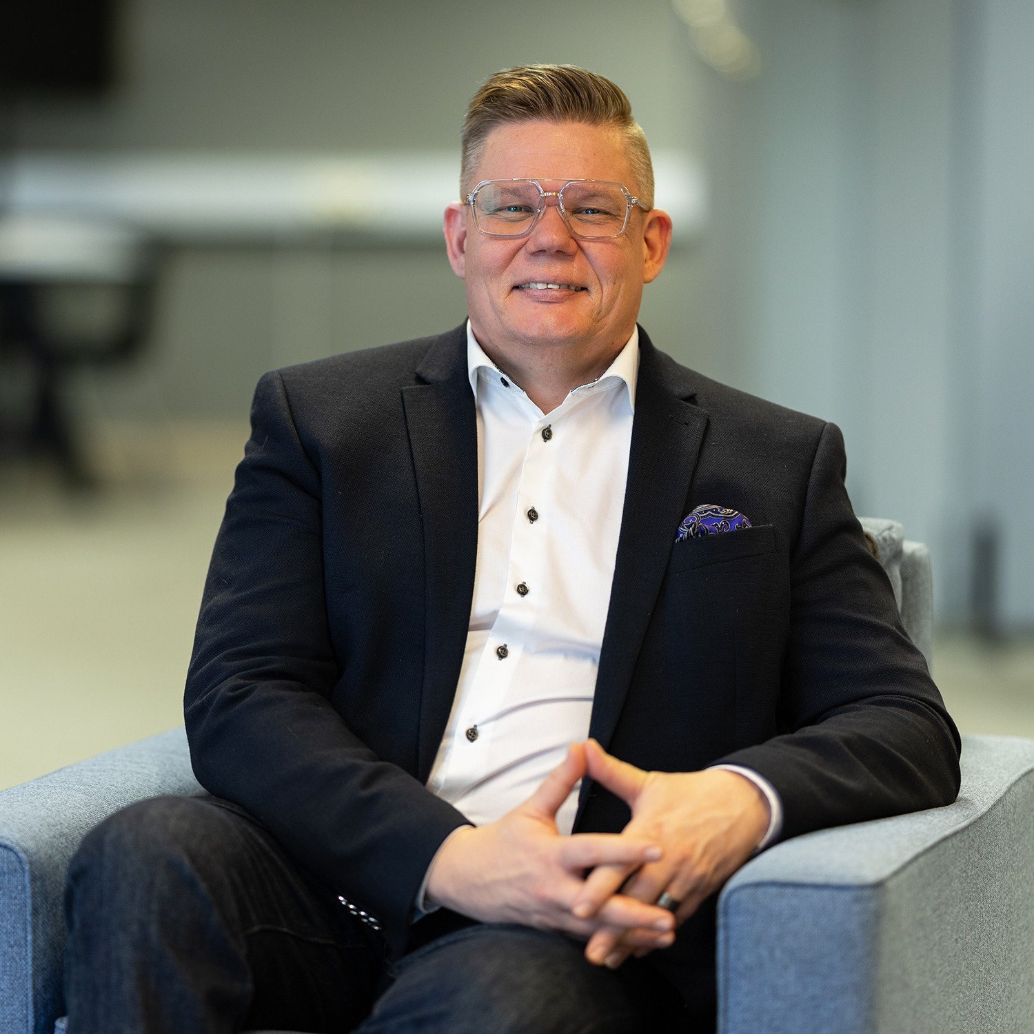 Portrait of John Doe Anderson, CEO of Omnis.