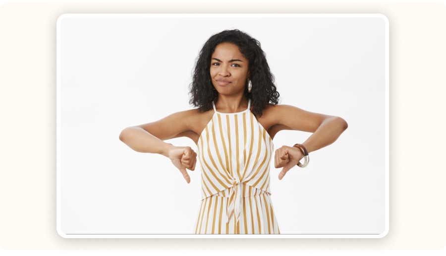 Person showing a gesture of disapproval.