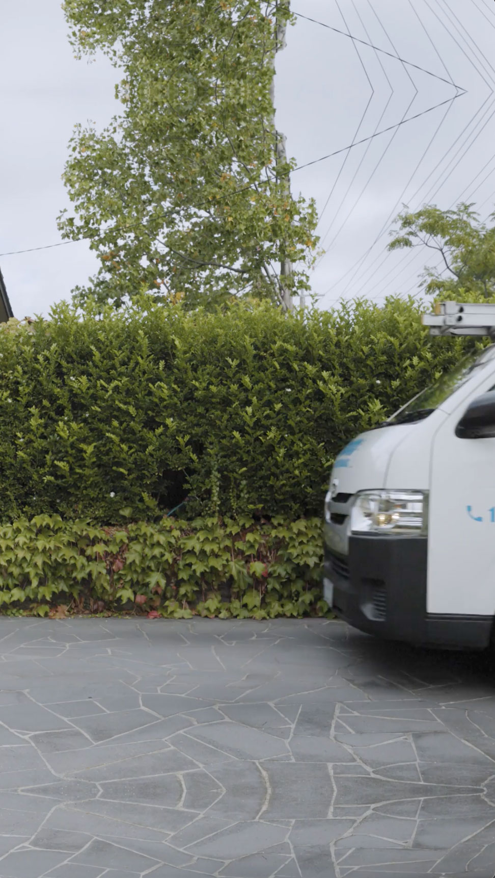 An empty driveway at a suburban residence
