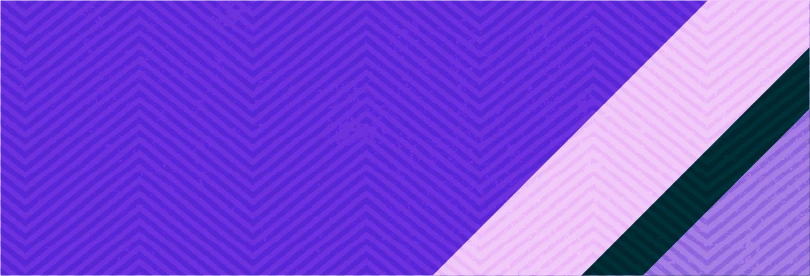 Three smiling women in a circle listening to a speaker