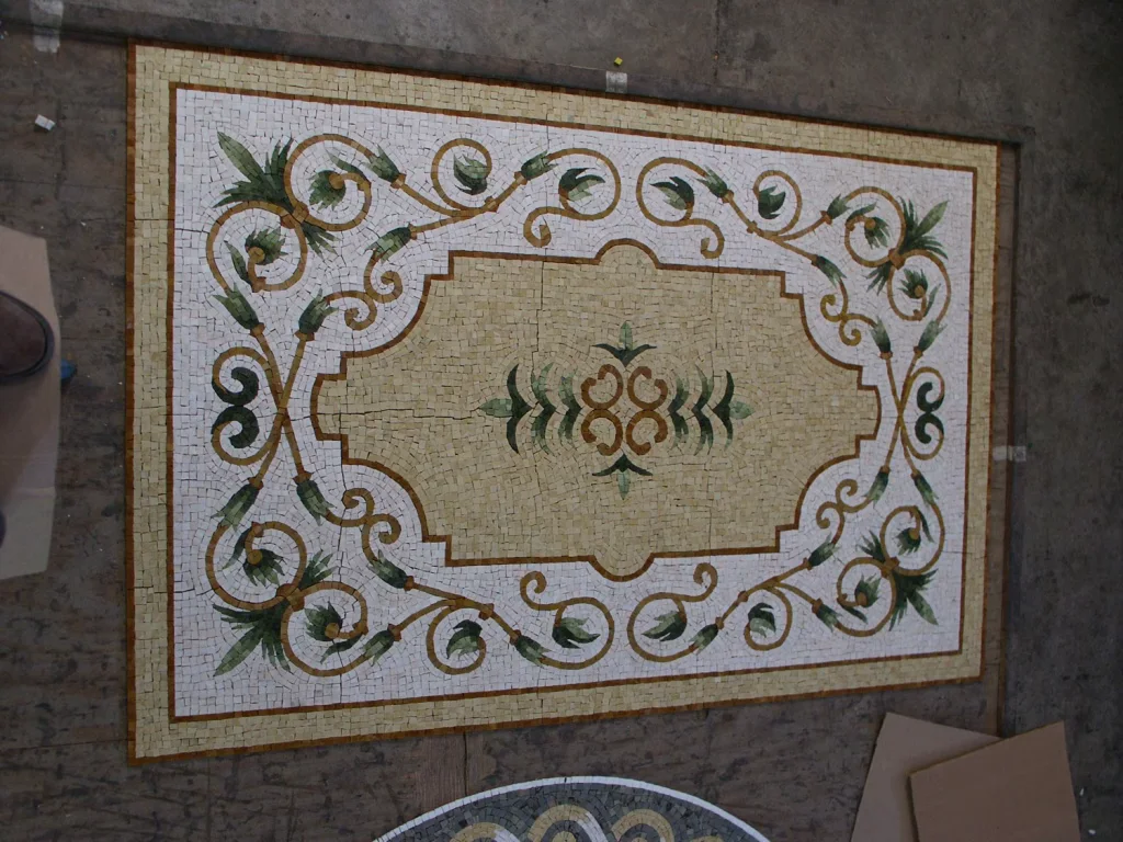 Vine Cartouche mosaic pool medallion, Green vine on cream, hand-cut stone — reference M-02, Mosaiclegs Art Studio