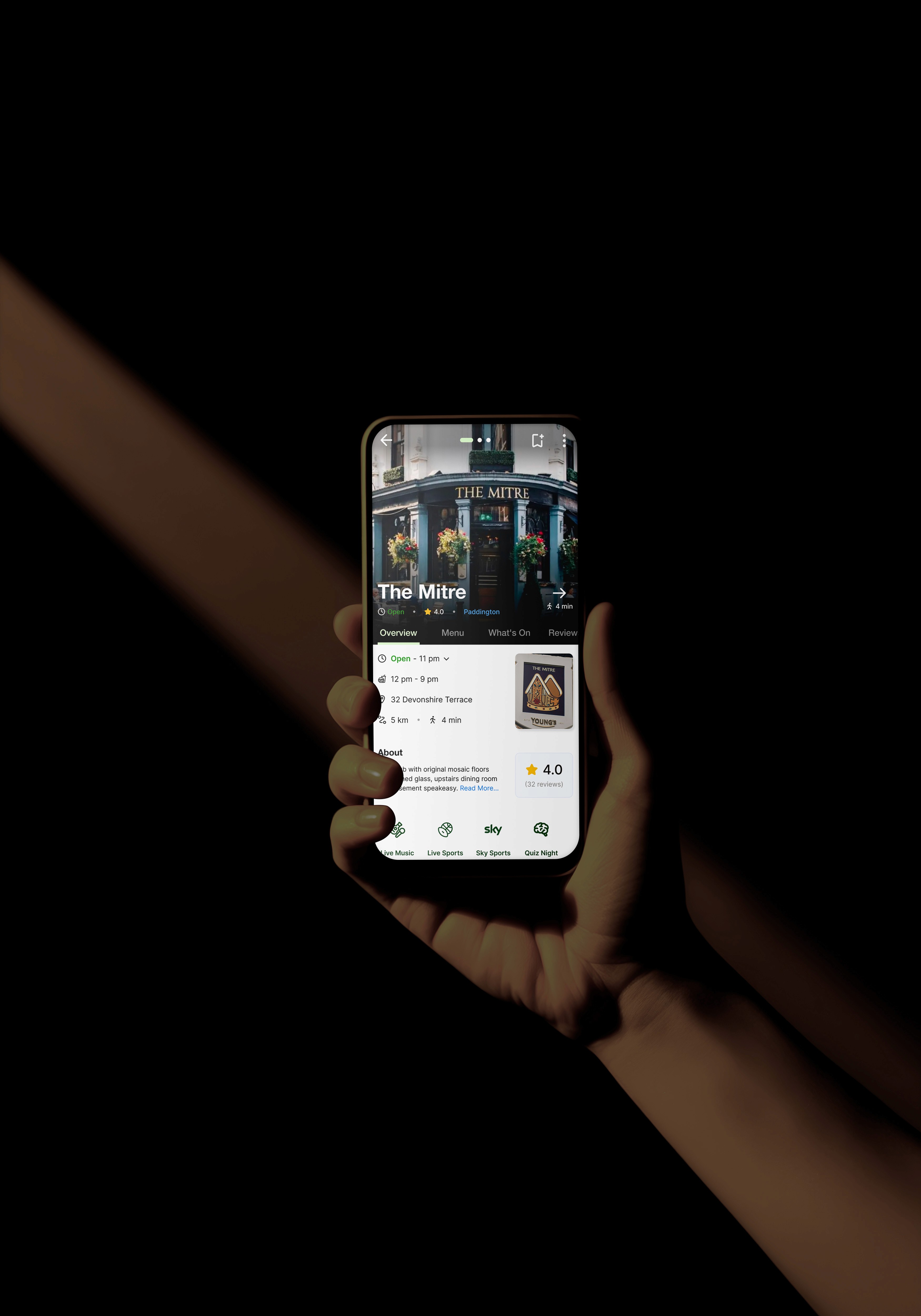 Image of man holding phone with Transit Live Main Landing Interface