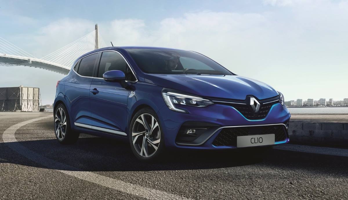 Blue Renault Clio car parked on the road. Modern compact hatchback vehicle.