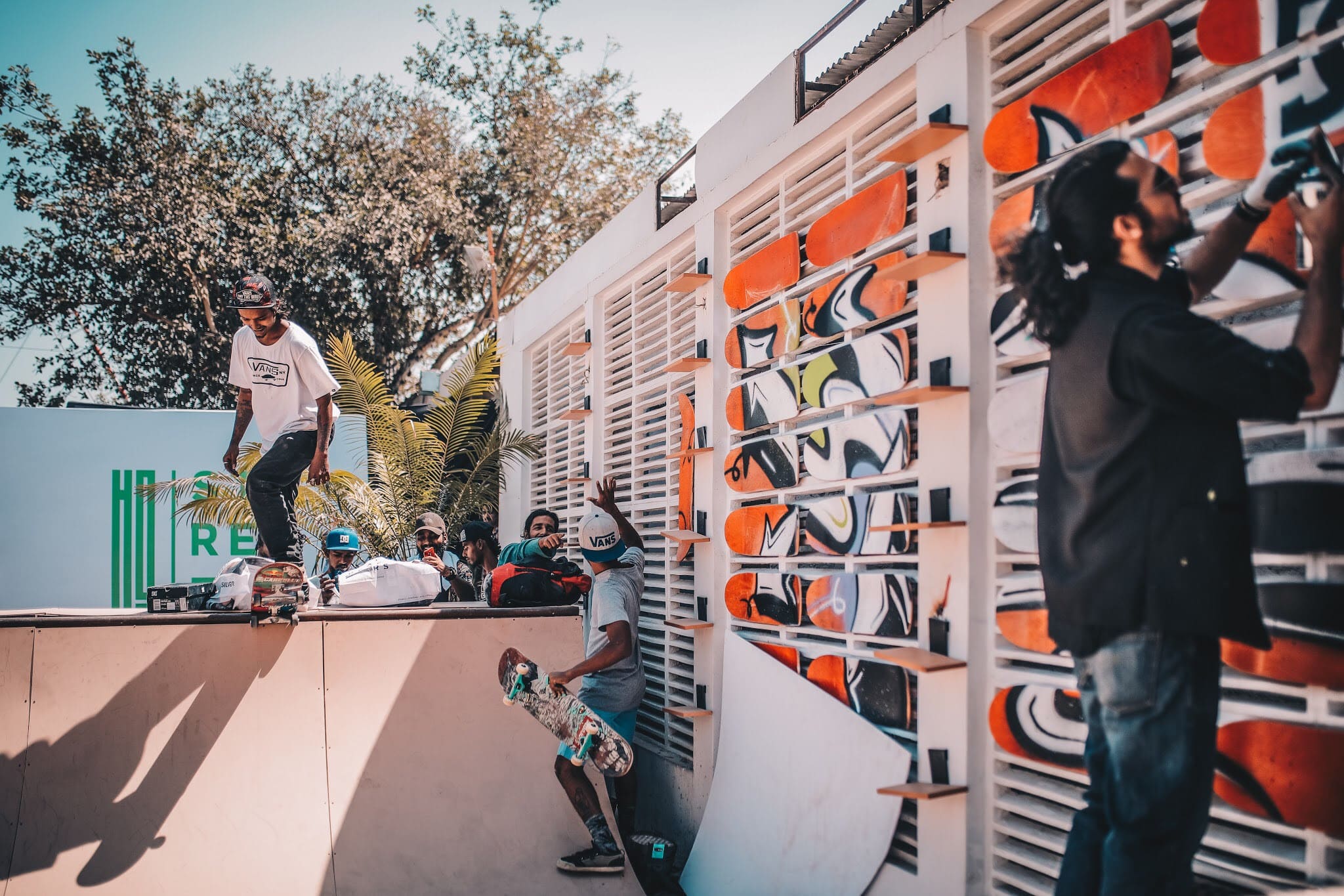 While spray painting mural at HG Street festival