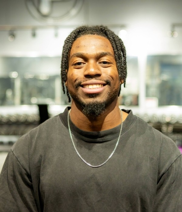black and gray dumbbells on brown wooden crate