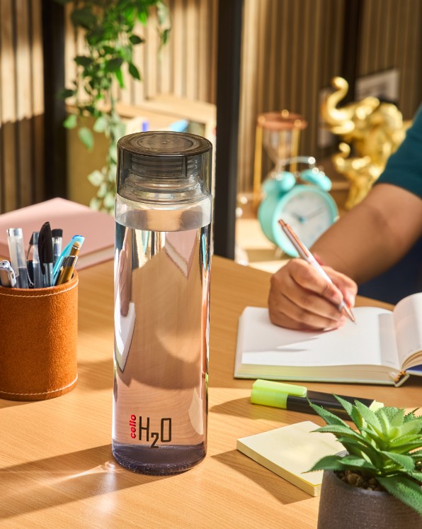 Cello's lifestyle shot of a water bottle on a study desk