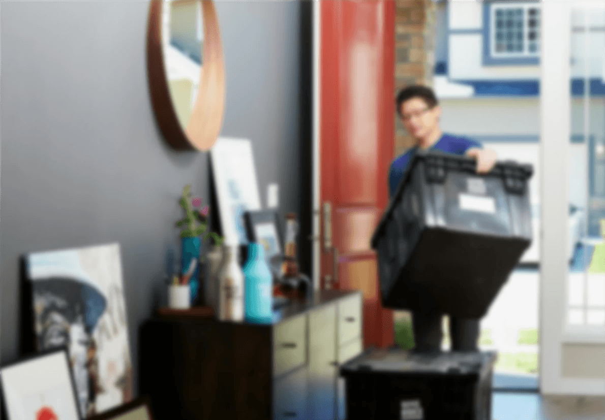 man in blue polo shirt sitting on chair