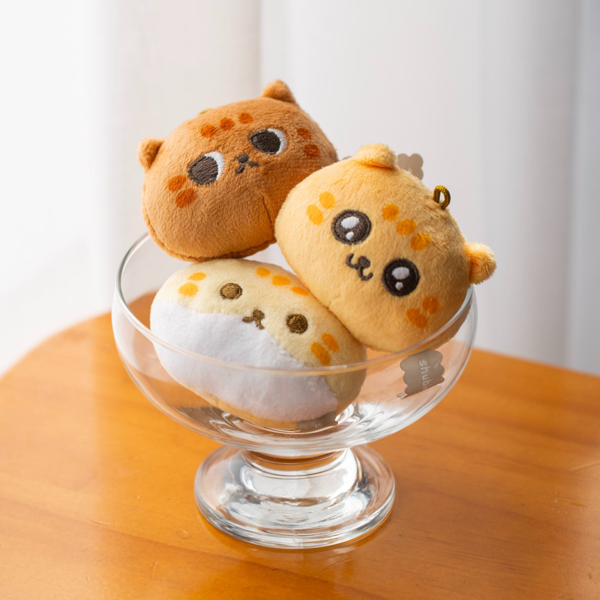 A close-up view of dark green leaves, creating a lush, textured background with subtle variations in color.