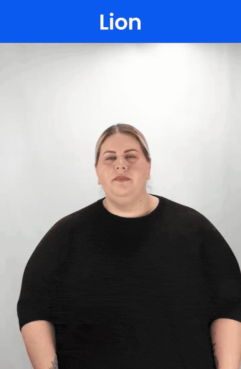 Animated GIF: a Deaf signer signs LION in ASL, a curved hand with spread fingers sweeping from the forehead up and back over the head.