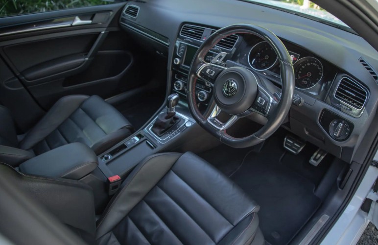 a close up of a steering wheel in a vehicle