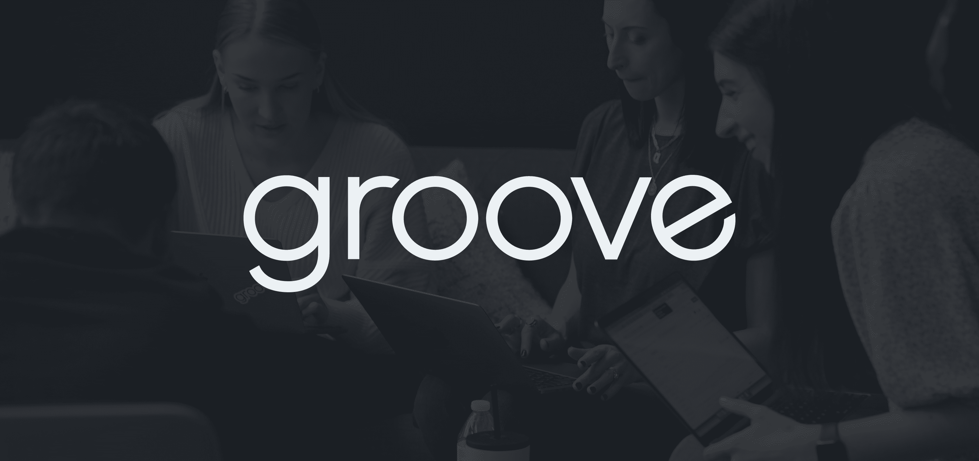 Groove logo in white in front of a dark background