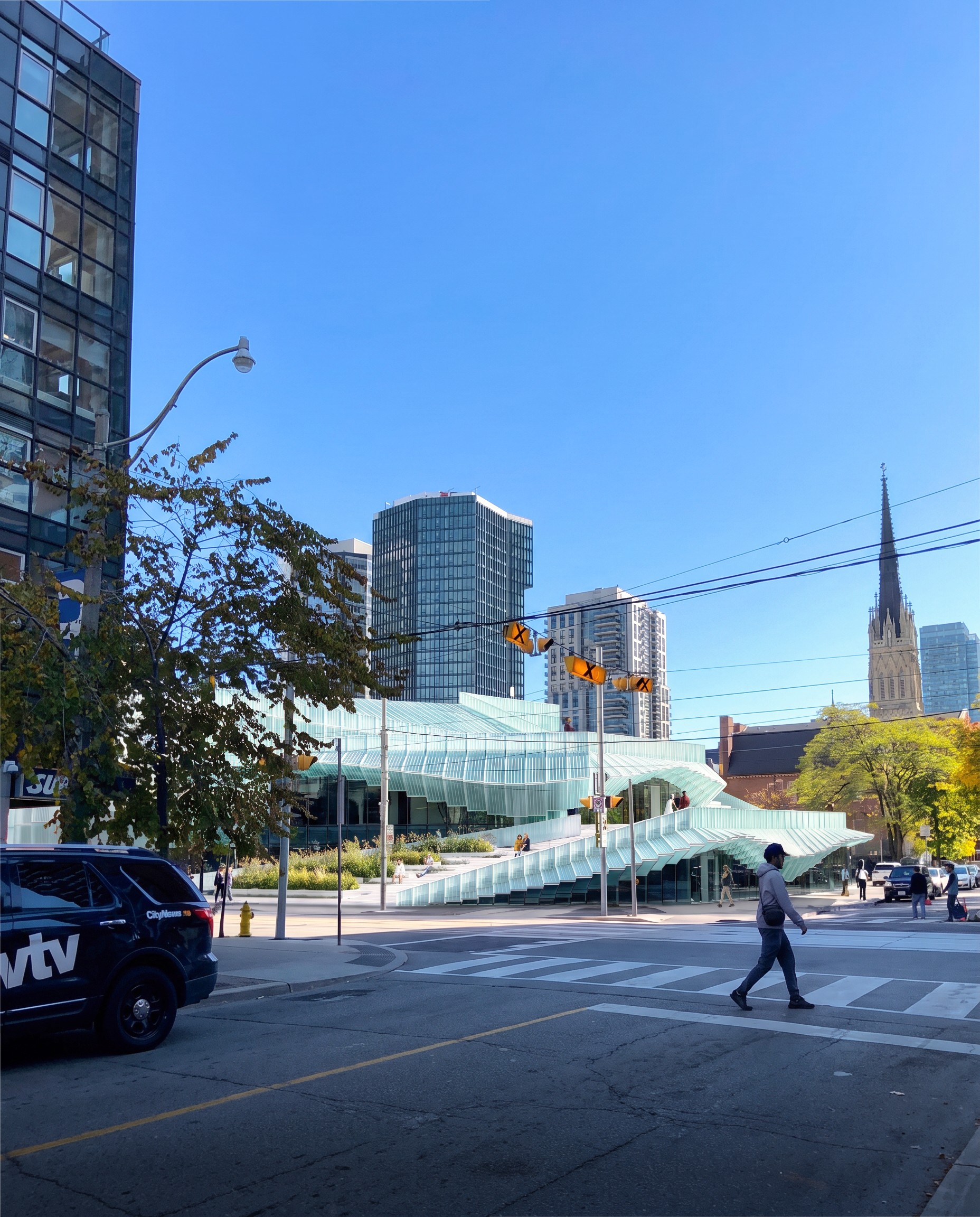 Exterior daytime render of “Diffusion” and its playfull facade opening for public bystanders.