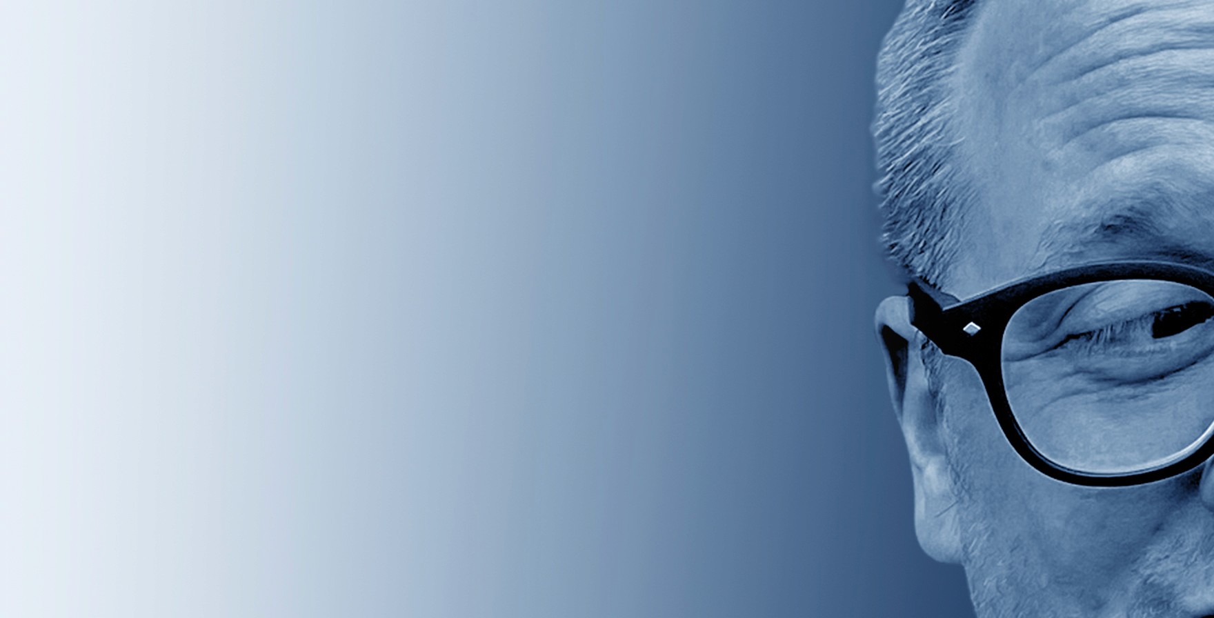 Grayscale close-up portrait of Jeremy J. McLean, Senior UX, Visual, and Motion Designer, featured in hero banner with gradient blue background.