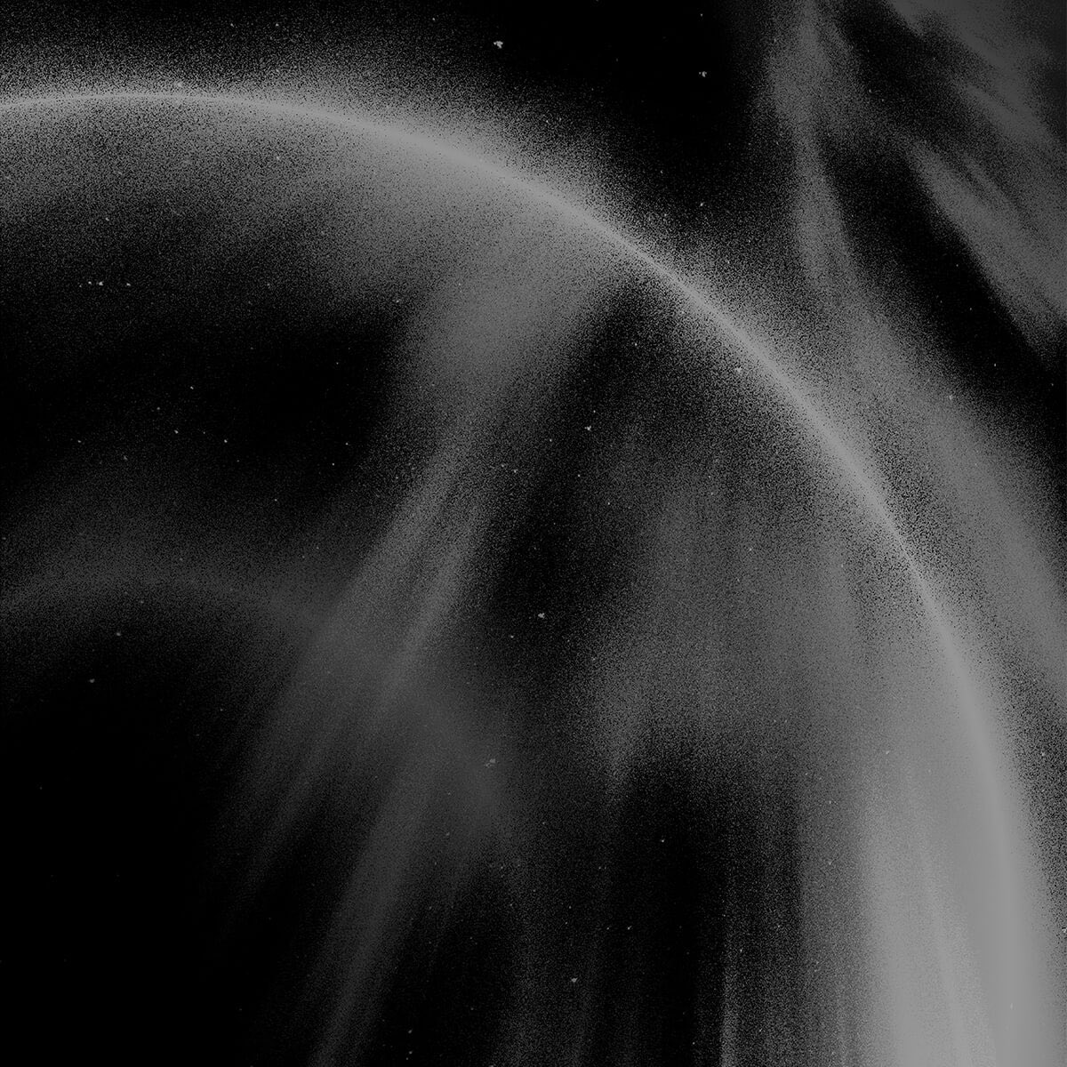 Sleek curved building with expansive glass windows, reflecting the sky and cityscape.