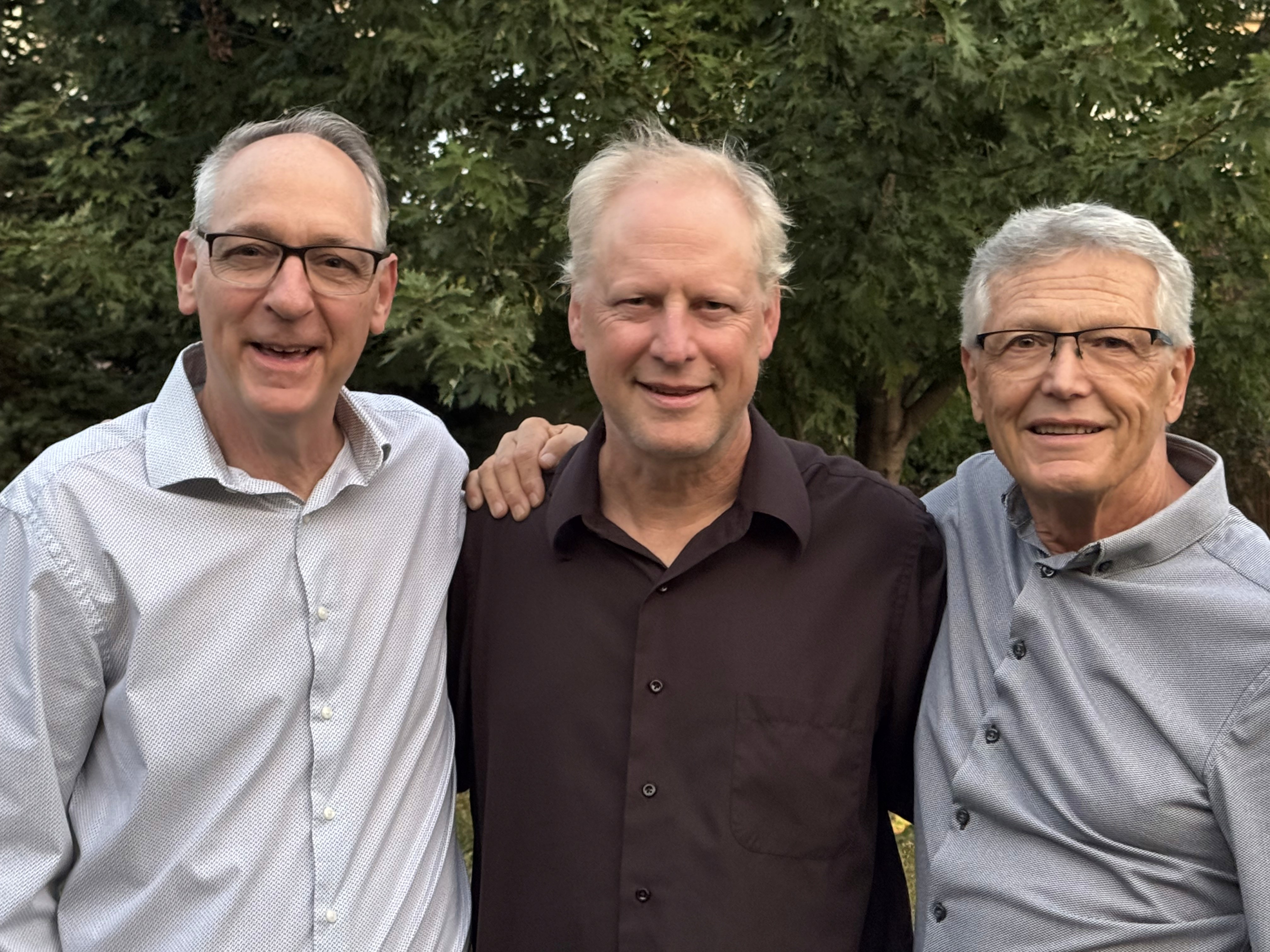 3 jazz musicians posing for a picture