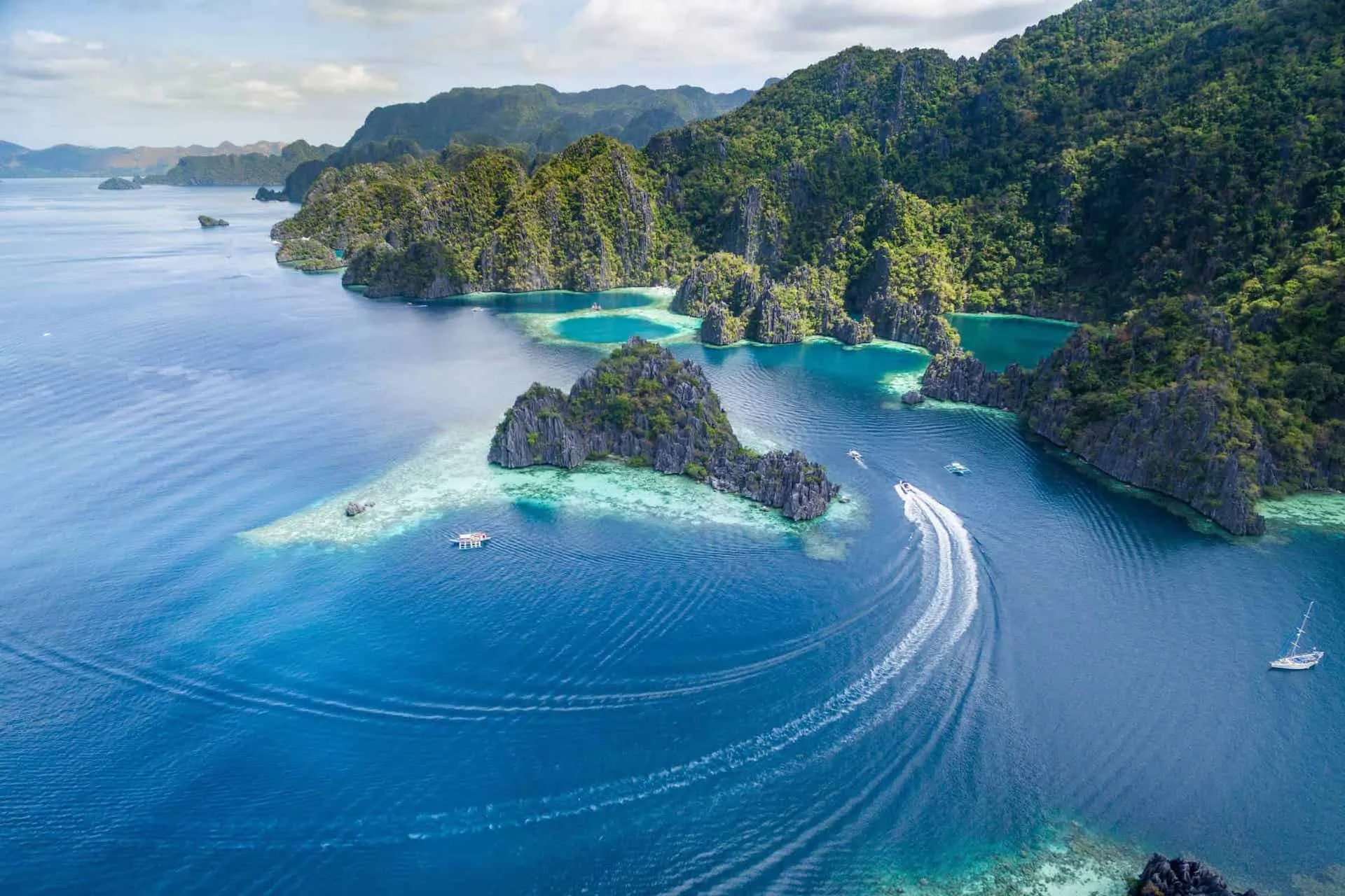 aerial view of village on mountain cliff during orange sunset