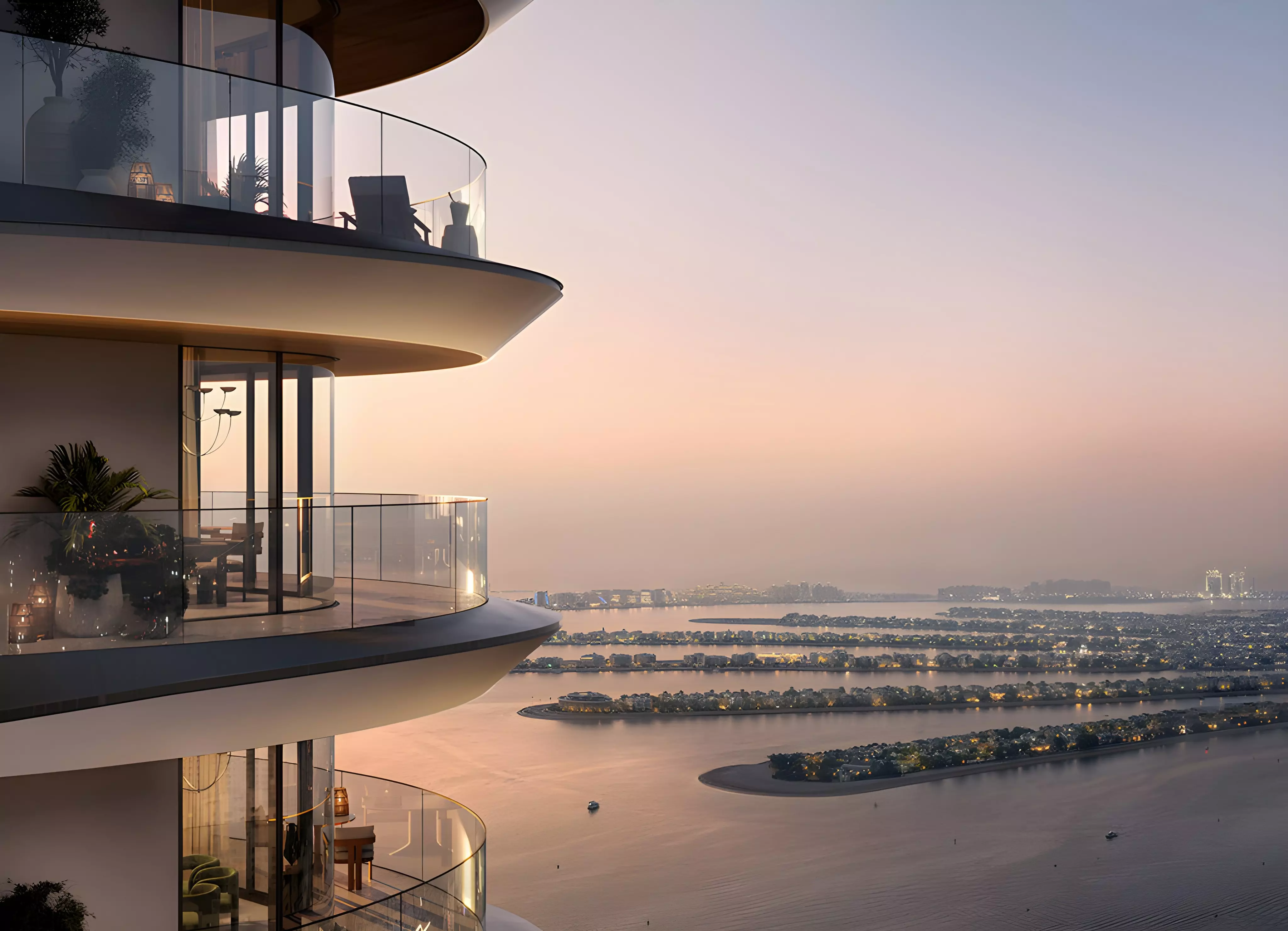 Curved glass balconies overlooking Palm Jumeirah at sunset from The Bristol at Emaar Beachfront in Dubai