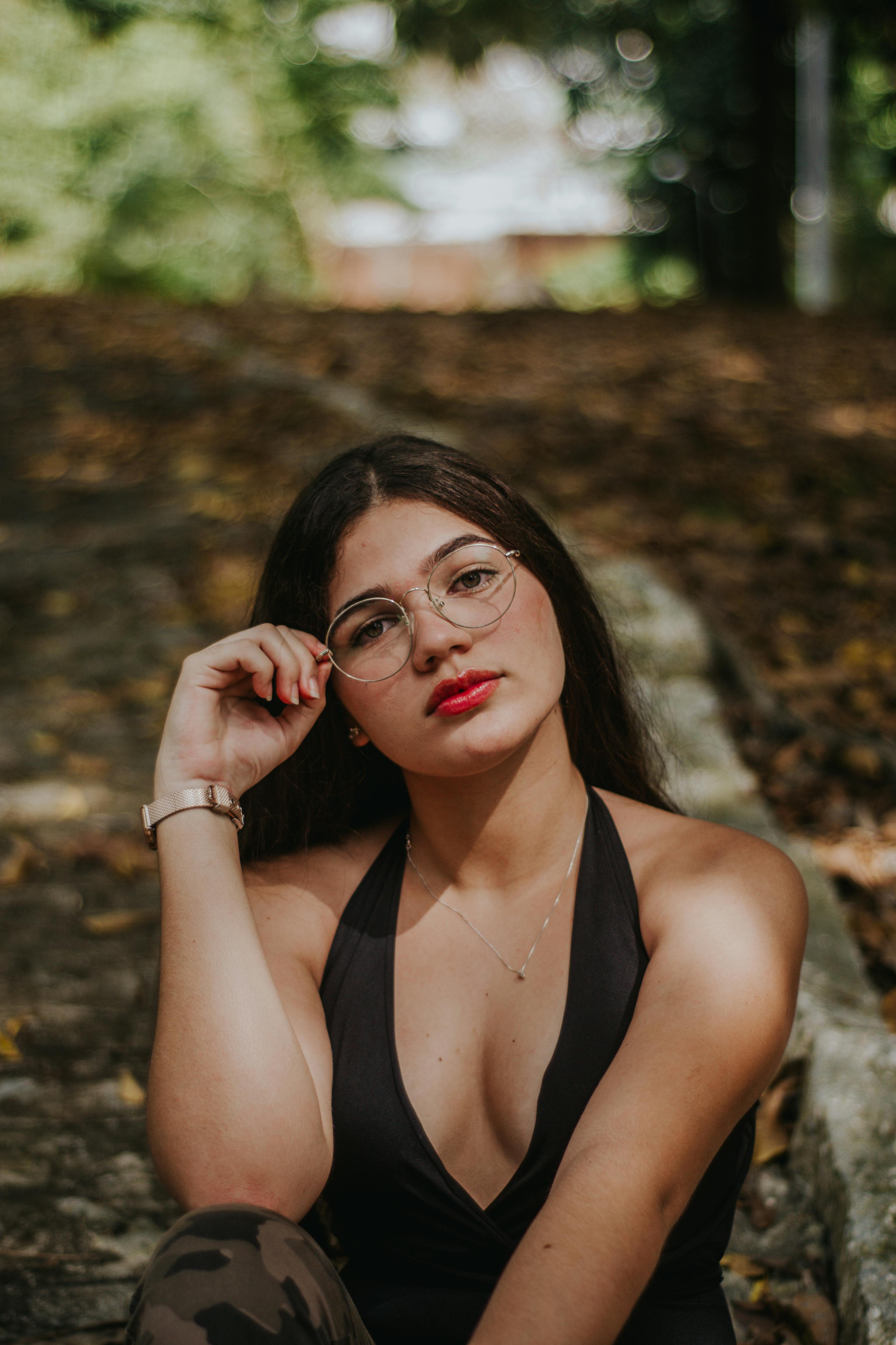 kids lying on a glass land and smiling