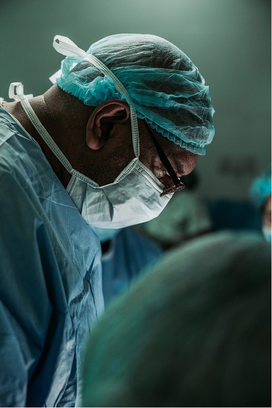 Close up of a surgeon showing the human side of Medtronic’s digital surgery work captured through Woodrow storytelling.