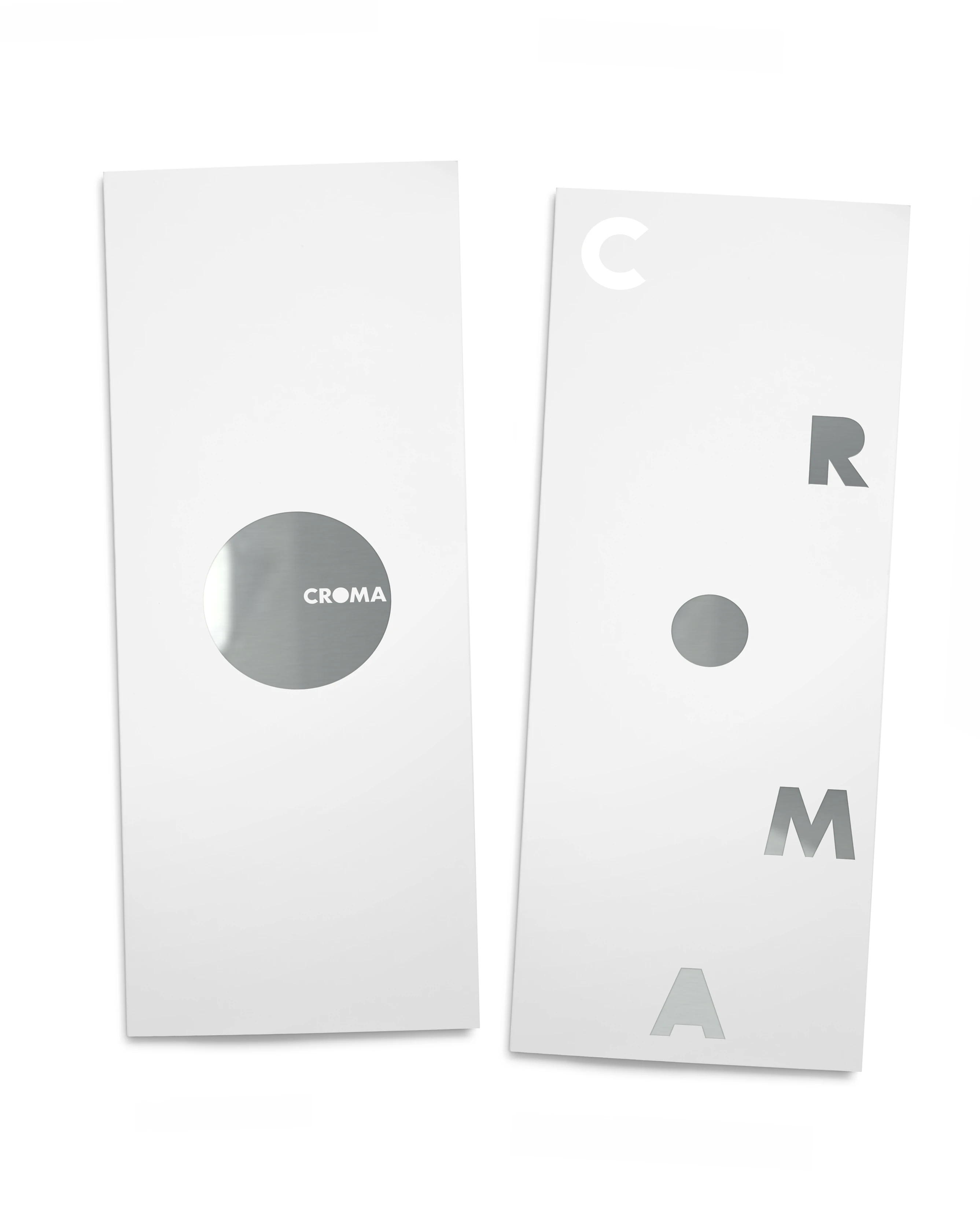 Two tall Croma leaflets with the logo split across letters, brand identity design by Sebastian Saavedra