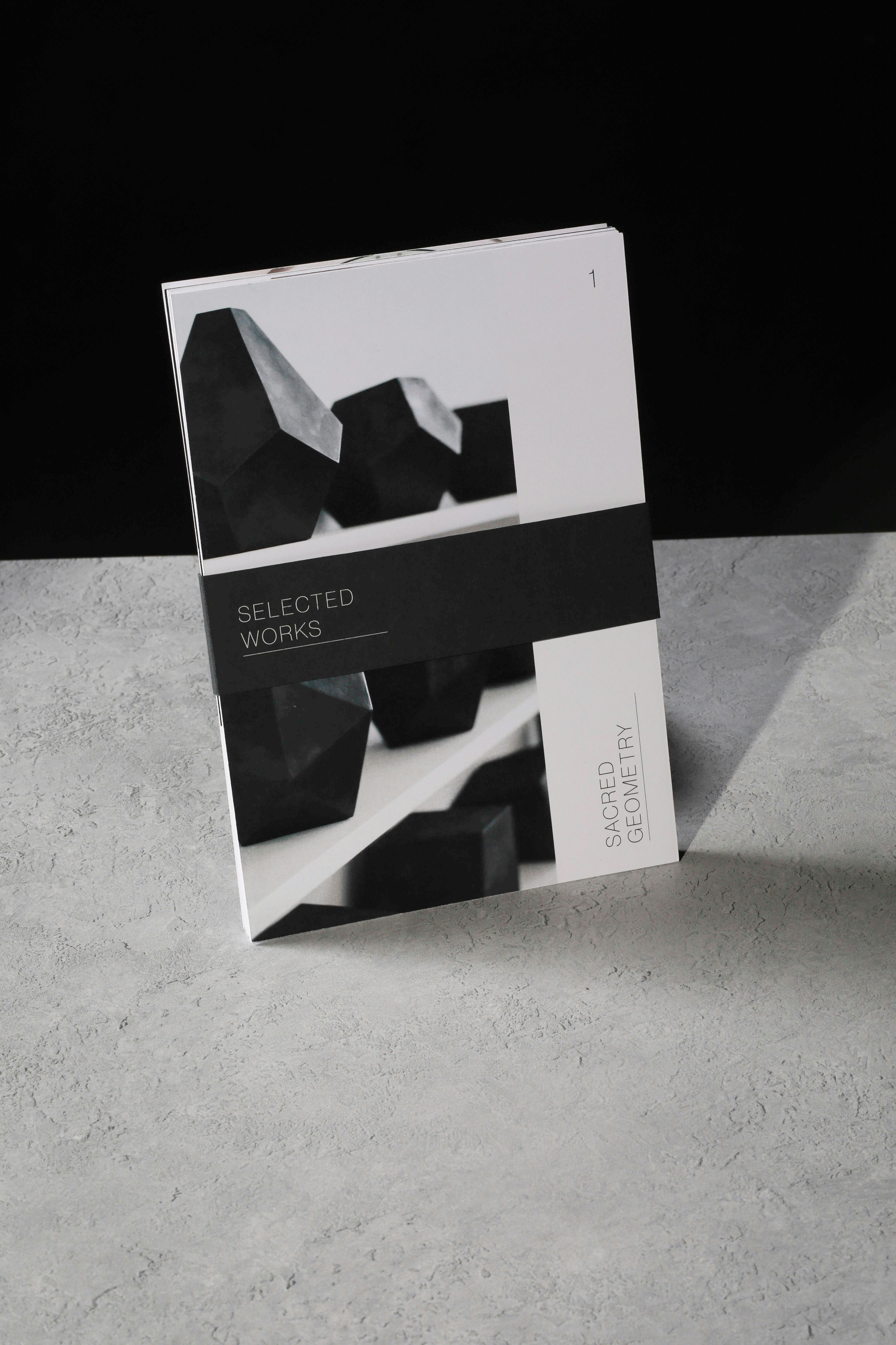 A black and white book sitting on top of a table