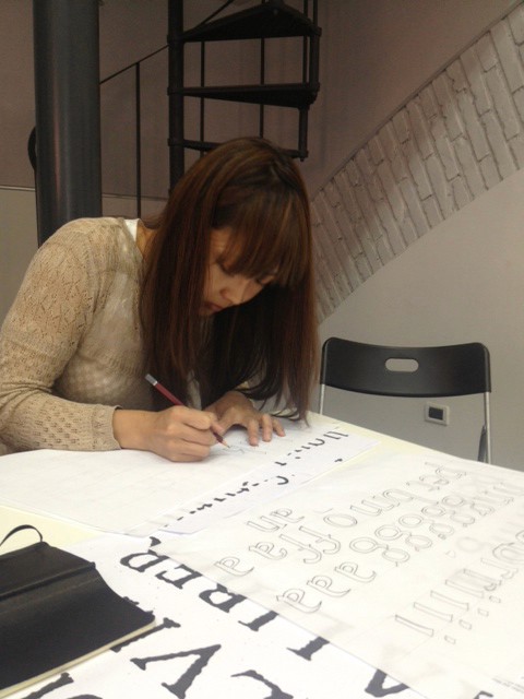 student drawing typeface