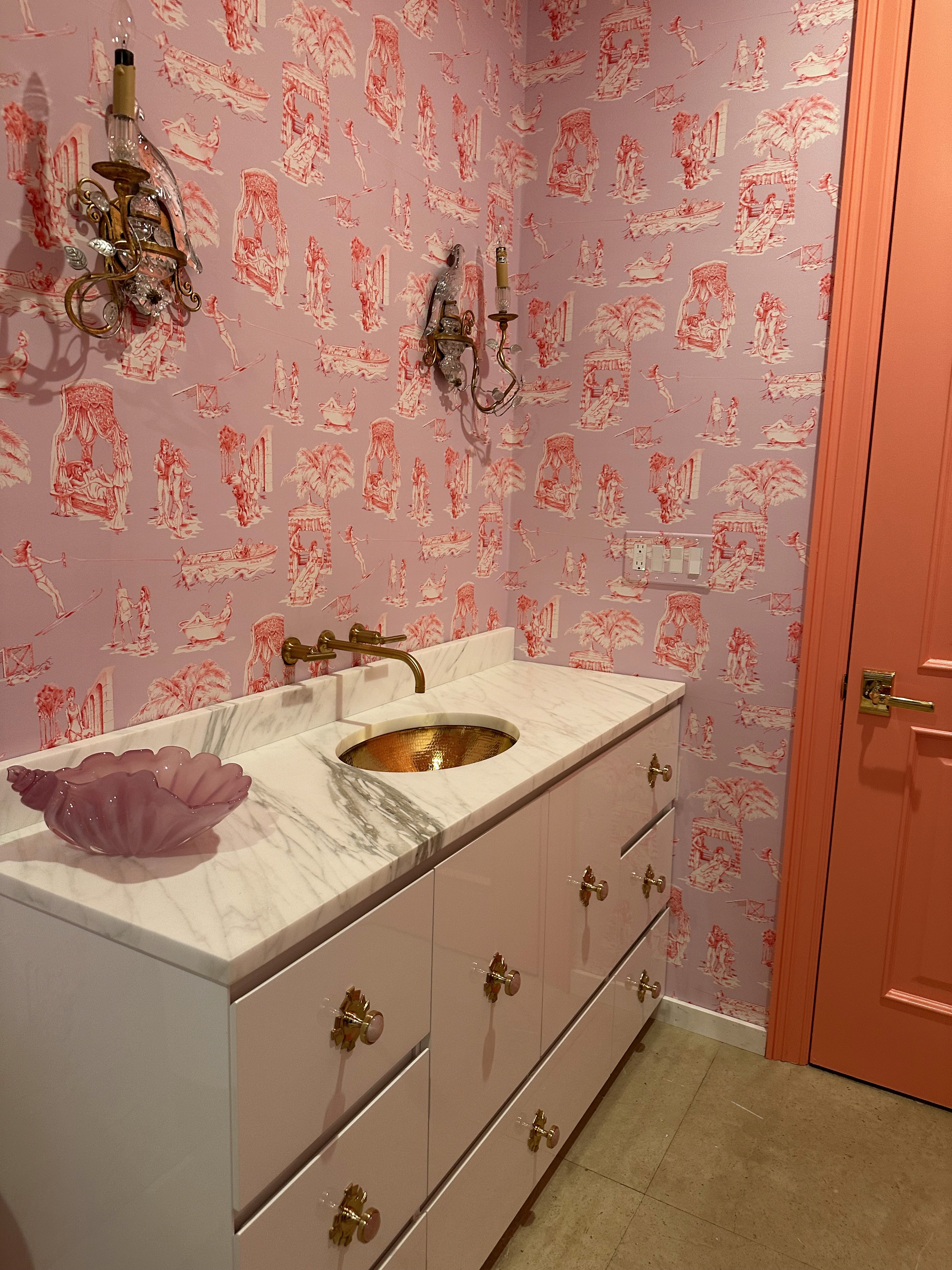 Luxury bathroom wallpaper installation with geometric wallcovering