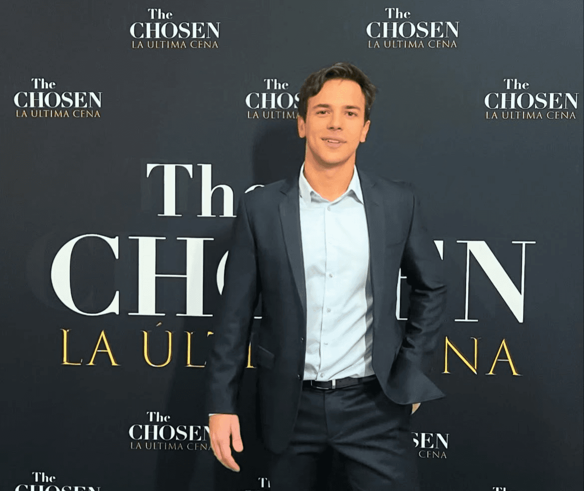 a black man wearing a headphone, side view