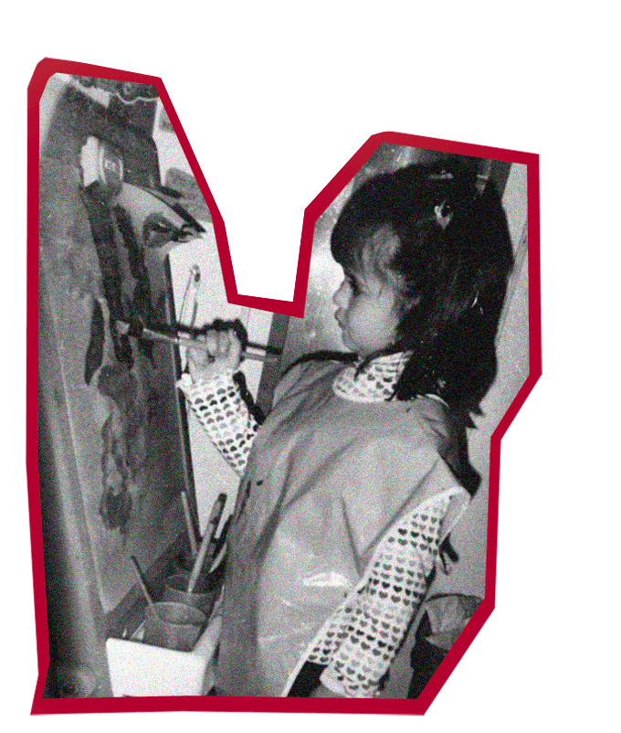 A thoughtful young person with dark hair gazes to the side, captured in soft black and white lighting.