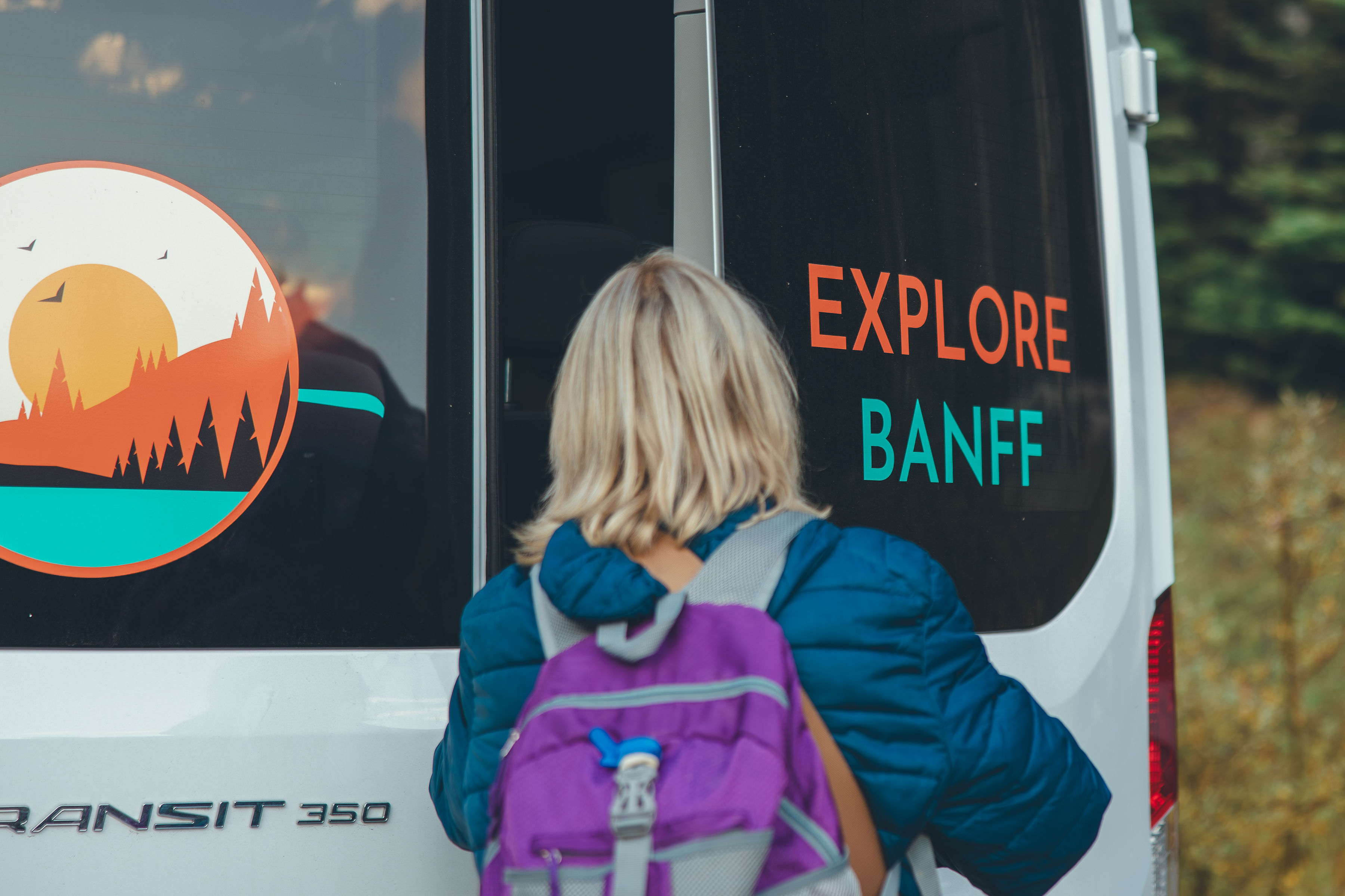 Explore Banff Tours van and guest