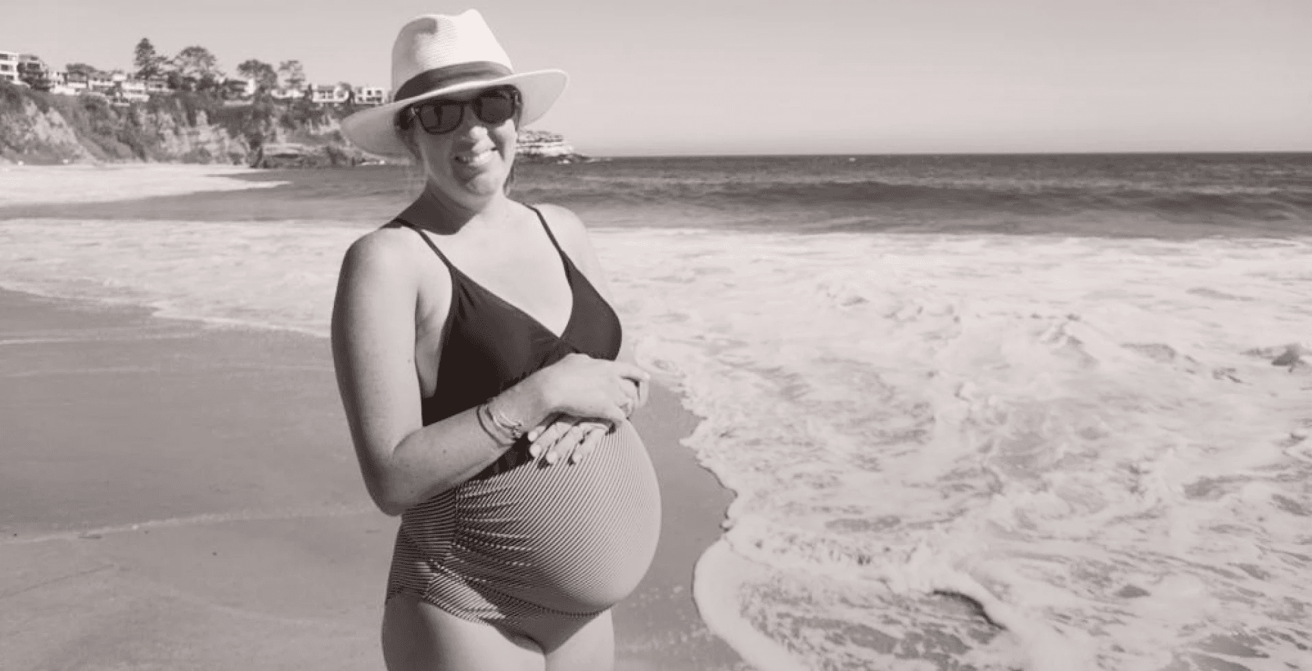 Pregnant woman on a beach